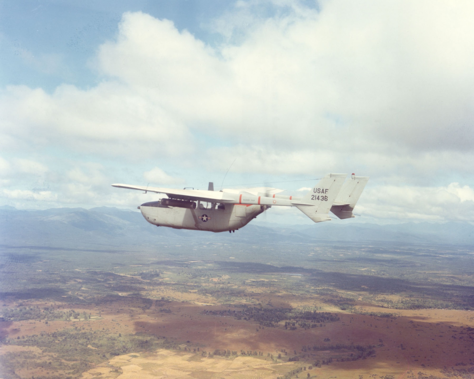 O-2A in flight near Pleiku in 1968. Faster than the O-1 Bird Dog, the O-2A could respond to calls for air support more quickly and could stay over the target longer. (U.S. Air Force photo)