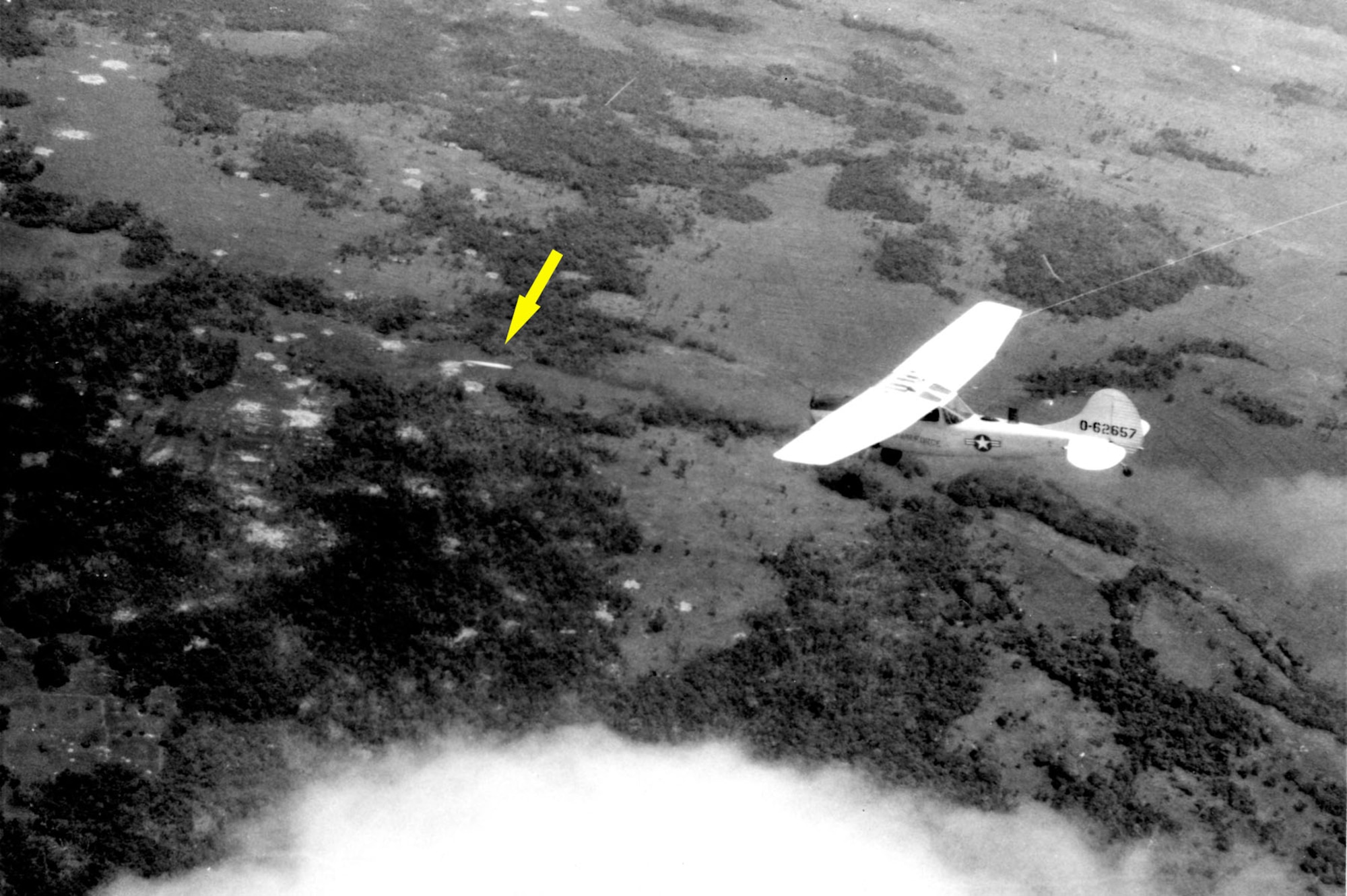 An O-1F pilot of the Red Marker FACs at Tan Son Nhut AB fires a marking rocket at an enemy site near Tay Ninh City. The Red Markers, officially known as Advisory Team 162, provided FAC support for the ARVN Airborne Division. (U.S. Air Force photo)