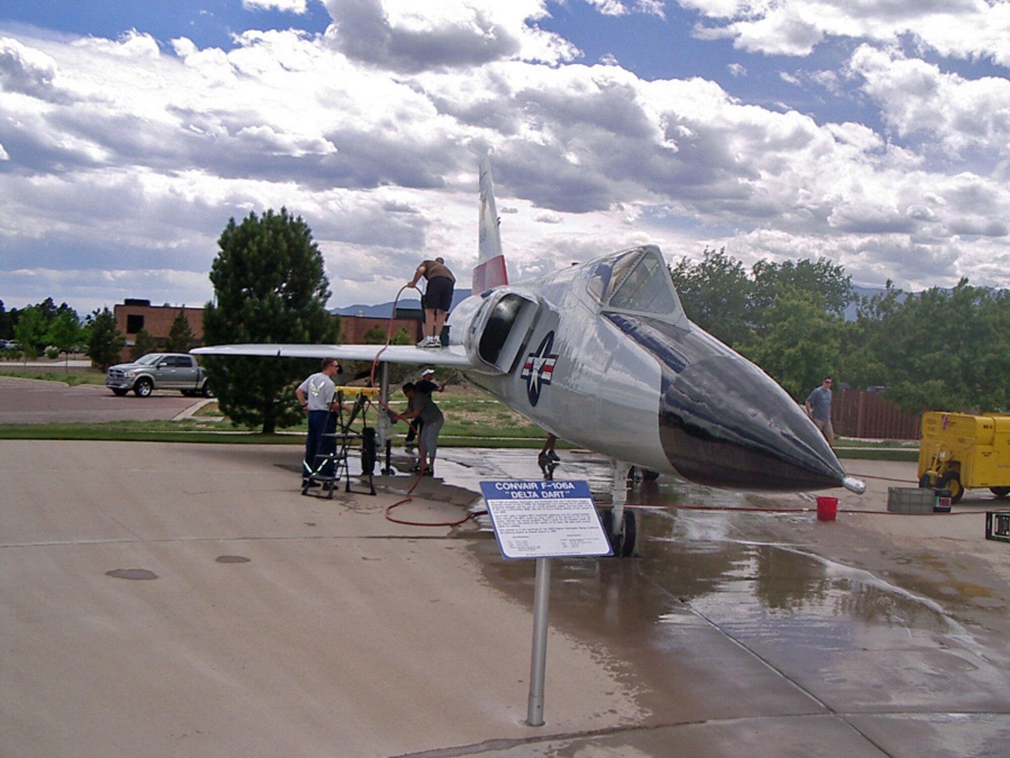A combined team of Airmen from the 7th Space Operations Squadron, 310th Communications Flight, and the 561st Network Operations Squadron, kick off the Peterson Air and Space Museum’s “Adopt-A-Plane” season by scrubbing down their adopted F-106 “Delta Dart” June 5. Under the program, organizations in the area assist museum staff with periodic cleaning of the museum’s display aircraft.  Organizations interested in adopting a museum aircraft can contact Jeff Nash, Peterson Air and Space museum deputy director/curator, at 556-8314, for more information. (Air Force photo by Jeff Nash)

