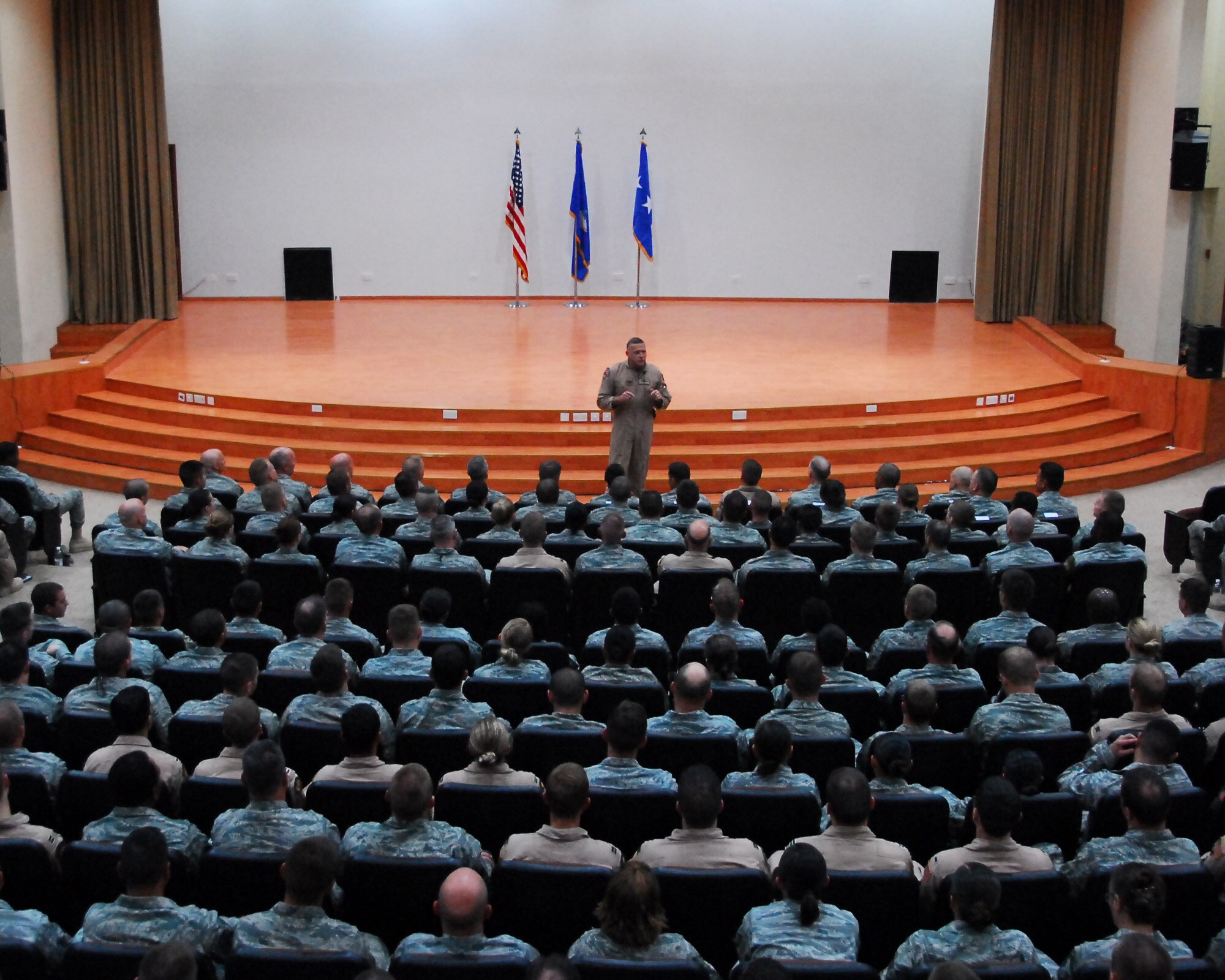 SOUTHWEST ASIA -- Lt. Gen. Gary L. North speaks to Airmen during his visit to the 386th Air Expeditionary Wing in Southwest Asia, June 12. General North addressed any questions the Airmen had, from uniform changes to the movement in Afghanistan. General North is the commander of 9th Air Force and U.S. Air Forces Central. (U.S. Air Force photo/Senior Airman Courtney Richardson)