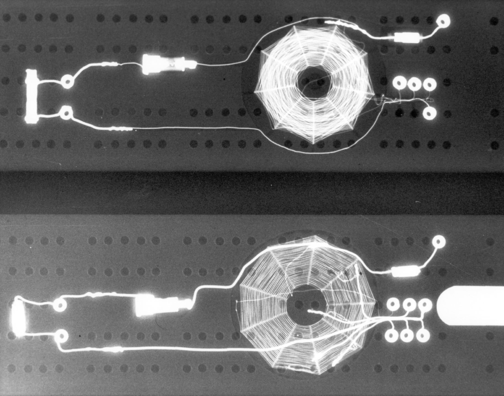 X-ray photograph of radio concealed in a cribbage board. (U.S. Air Force photo)