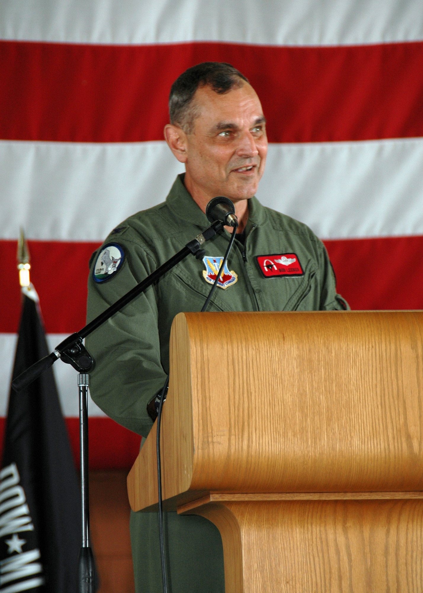 END OF AN ERA.  Colonel Robert Leeker, 131st Fighter Wing Commander, spoke at the 131st Fighter Wing End of Era Ceremony, at the Missouri Air National Guard Base-Lambert Field, June 13, 2009.  "Today we are merely turning a page in our history book.  The 131st (Fighter Wing) and the 110th (Fighter Squadron) lives on," said Leeker.  The ceremony commemorated the culmination of 86 years of flying operations in Saint Louis.  (U.S. Air Force Photo by Senior Airman Amber Hodges.  RELEASED)