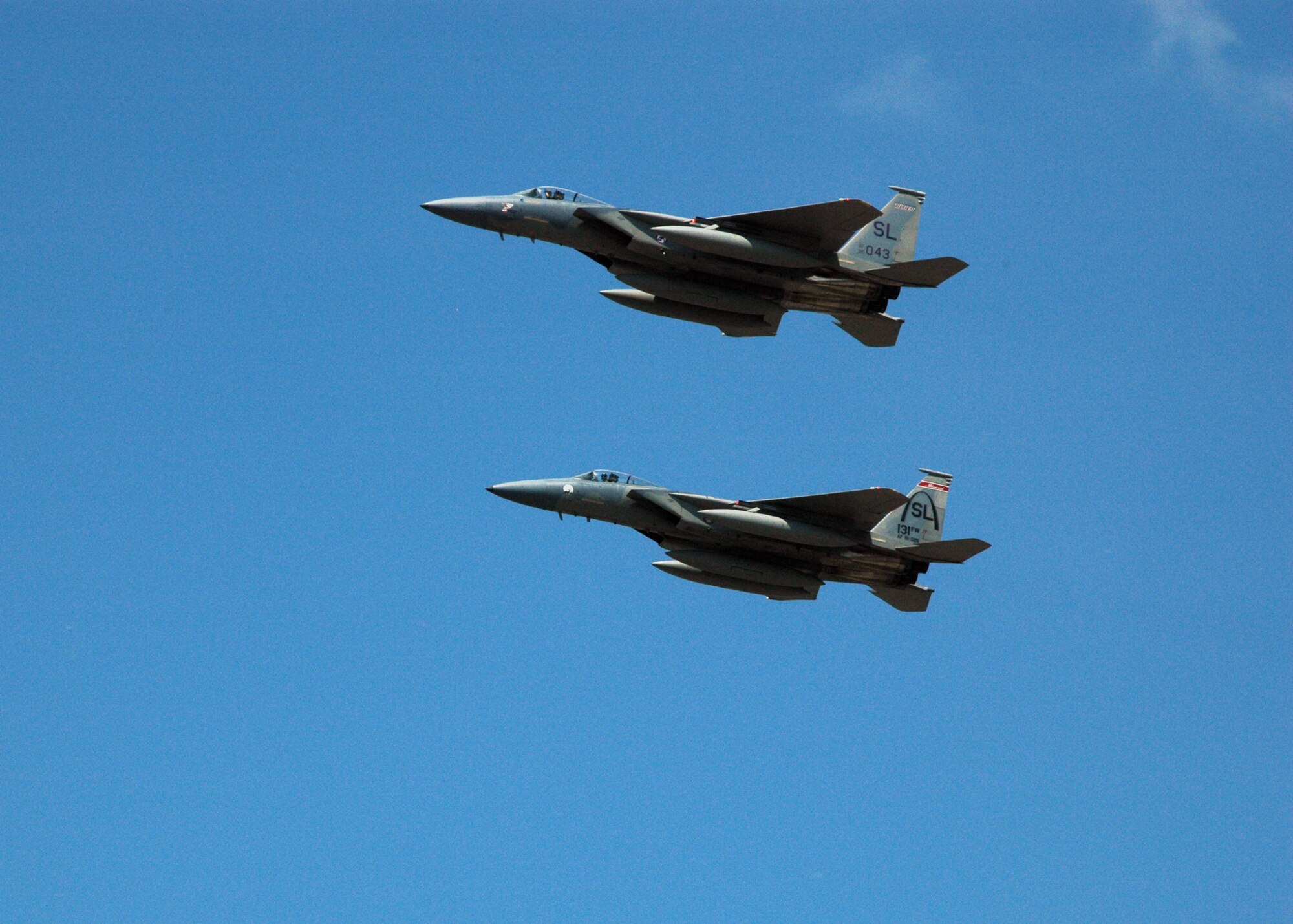 END OF AN ERA.  Colonel Robert "MOS" Mohr, 131st Operations Group Commander, and Lt. Colonel Reed "Snake" Drake, 110th Fighter Squadron Commander, do a final flyby for the crowd at the End of Era Event held at the 131st Fighter Wing Lambert International Airport June 13, 2009.  This was a final flight for the F-15C's with the 131st FW before heading to Hickam AFB, Hawaii.
 (U.S. Air Force Photo by Master Sgt,. Mary-Dale Amison.  RELEASED)