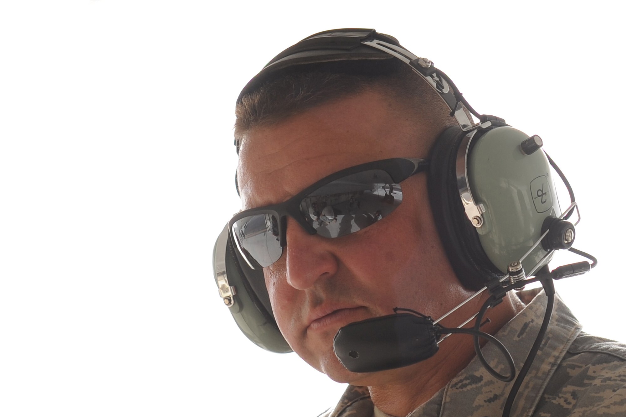 SOUTHWEST ASIA - Tech. Sgt. John McMurphy, 380th Expeditionary Aircraft Maintenance Squadron, Sentry Aircraft Maintenance Unit, looks on as fellow maintainers prepare an E-3 Sentry for take-off, June 10 at an undisclosed location in Southwest Asia. The Sentry maintainers work around the clock performing maintenance, launching and recovering the aircraft, keeping it flying the tasking order every day. (U.S. Air Force photo by Senior Airman Brian J. Ellis) (Released)