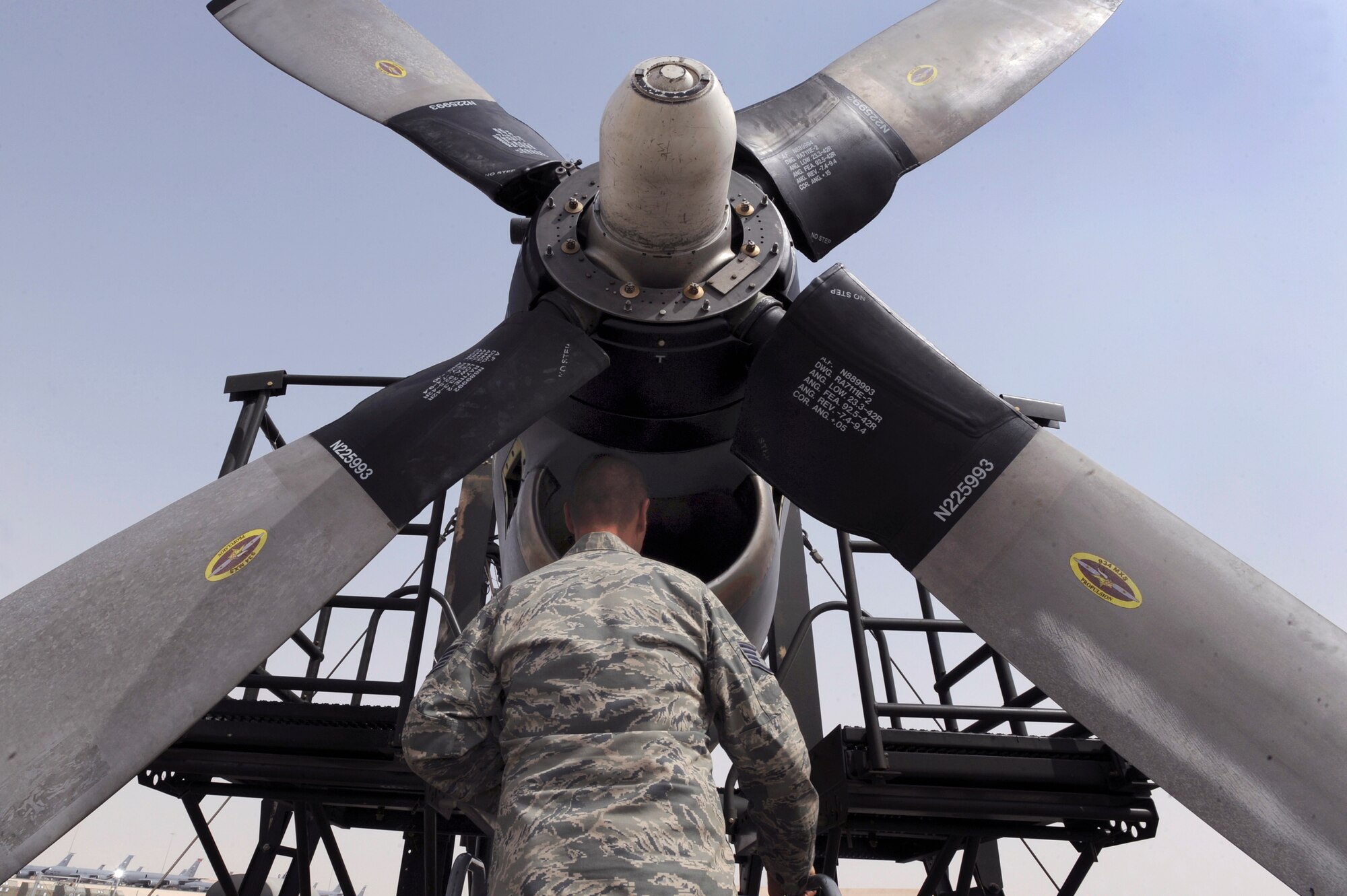 Tech. Sgt. Richard Replinger, a turbo propulsion craftsman with the 379th Expeditionary Maintenance Squadron performs a post inspection on a C-130H Hercules engine after running it in the new T56 engine test cell, June 14, 2009, in an undisclosed location in Southwest Asia.  The new test cell is the only one in the U.S. Central Command's area of responsibility, which allows engine tests to be carried out here in the AOR instead of going back to Ramstein AB, Germany.  Sergeant Replinger is native to Fayetteville, N.C. and is deployed from Hurlburt Field Air Force Base, Fla. in support of Operations Iraqi and Enduring Freedom and Combine Joint Task Force - Horn of Africa.  (U.S. Air Force Photo by Staff Sgt. Joshua Garcia/released)