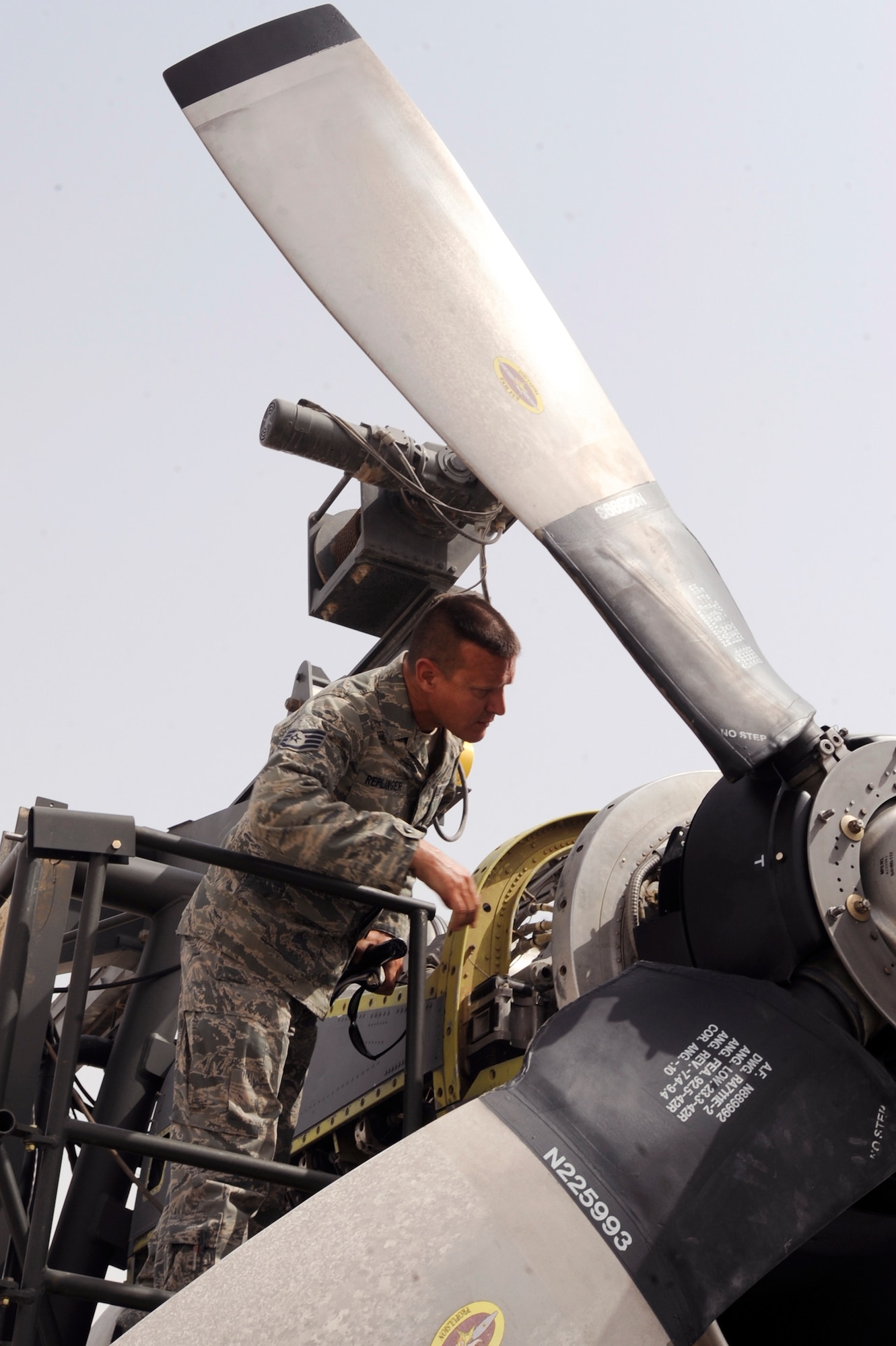 Tech. Sgt. Richard Replinger, a turbo propulsion craftsman with the 379th Expeditionary Maintenance Squadron performs a pre-run inspection on a C-130H Hercules engine prior to running a test on the engine, June 14, 2009, in an undisclosed location in Southwest Asia.  The test cell is the only T56 testing rig in the U.S. Central Command's area of responsibility, which allows engine tests to be carried out here in the AOR instead of going back to Ramstein AB, Germany.  Sergeant Replinger is native to Fayetteville, N.C. and is deployed from Hurlburt Field Air Force Base, Fla., in support of Operations Iraqi and Enduring Freedom and Combine Joint Task Force - Horn of Africa.  (U.S. Air Force Photo by Staff Sgt. Joshua Garcia/released)