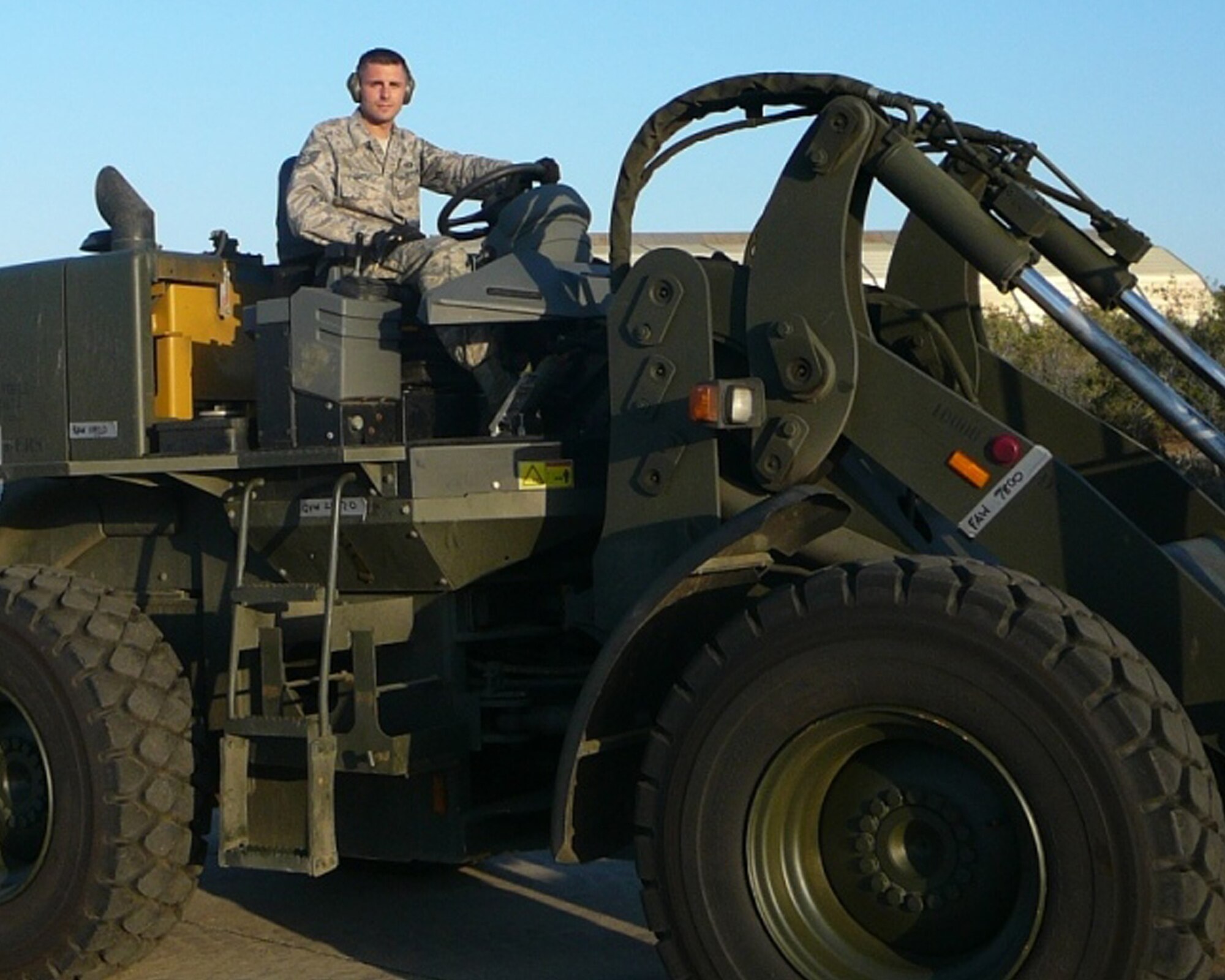 U.S. Air Force Tech. Sgt. Shawn Smith, 86th Air Mobility Squadron contingency airfield manager, prepares to download a C-17 Globemaster III aircraft while deployed to Royal Air Force Akrotiri, Cyprus, as an airfield manager for the 56th Rescue Squadron, RAF Lakenheath, United Kingdom. Sergeant Smith was recently selected as the Air Force Airfield Management Noncommissioned Officer of the Year for 2008. (Courtesy photo)