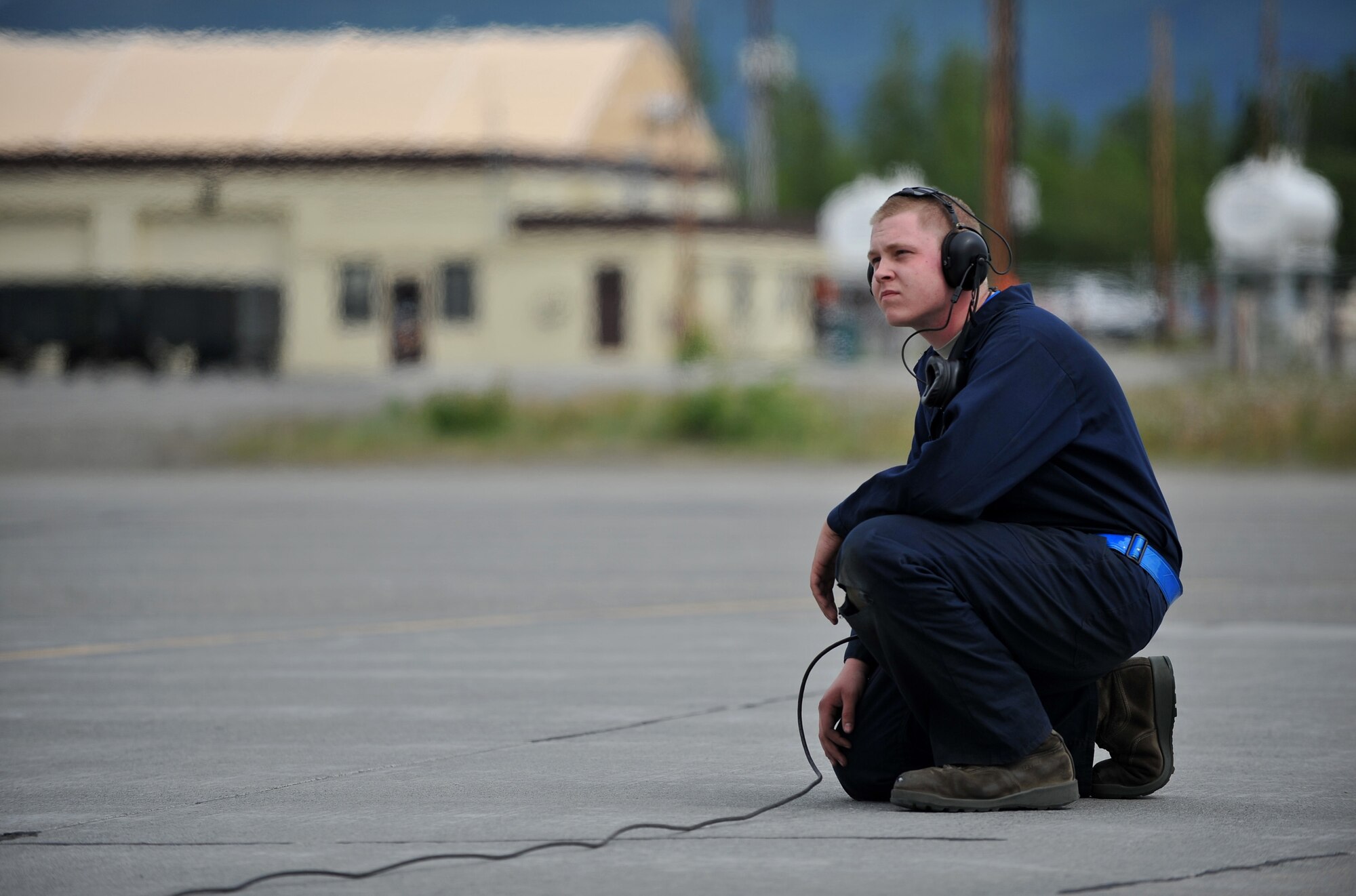 Airman 1st Class Shane Brewster prepares to launch his F-22 Raptor fighter aircraft for a mission June 17, 2009, during Northern Edge 09 held at Elmendorf Air Force Base, Alaska. Brewster is a member of the 525th Aircarft Maintenance Unit at Elmendorf AFB. Northern Edge is Alaska's largest military training exercise that prepares joint forces to respond to crises throughout the Asia-Pacific region. (U.S. Air Force photo/Master Sgt. Shane A. Cuomo)
