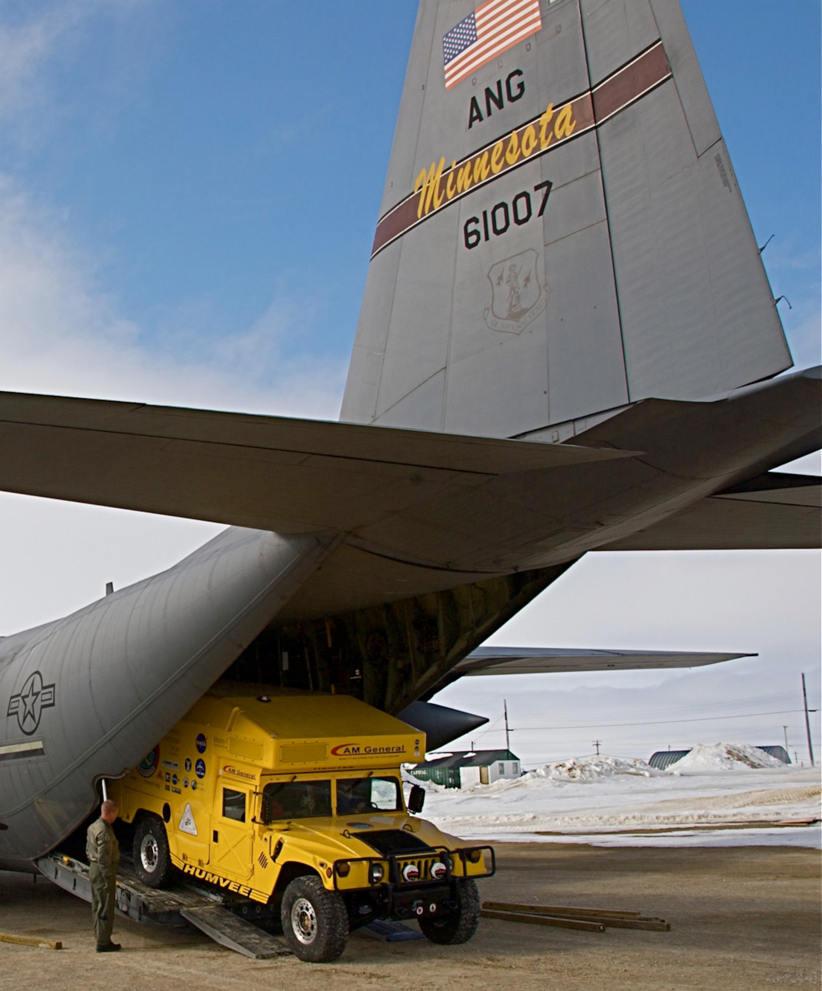 The Haughton-Mars Project Moon-1 Humvee Rover slowly drives from the belly of a  133rd Airlift Wing, Minnesota Air National Guard C-130 Hercules cargo aircraft in Resolute, Canada. The C-130 provided much needed airlift support transporting the "Moon-1" from Cambridge Bay Canada to Resolute Canada. HMP supports an exploration program aimed at developing new technologies, strategies, human's factors experience, and field-based operational know-how key to planning the future exploration of the Moon and Mars. 
U.S. Air Force Photo by Tech Sgt Erik Gudmundson (Released)
