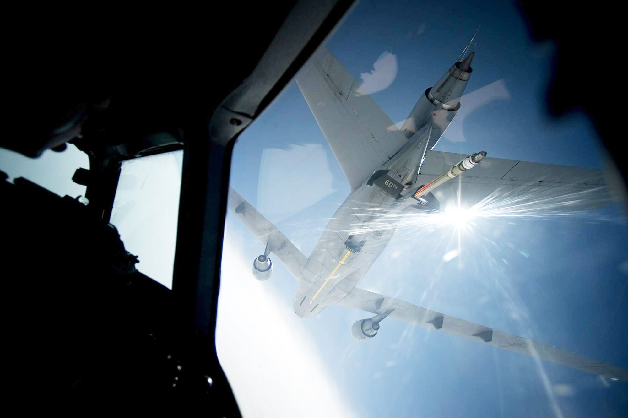 A KC-10 Extender aircraft from the 60th Air Mobility Wing, refuels a C-17 Globemaster during the Hydra Exercise 2009.  Hydra is a training exercise developed to provide a West Coast venue to train the 615 Contingency Response Wing's unique mission capabilities such as, command and control, aerial port, maintenance and air mobility liaison duties in a joint environment.  (U. S. Air Force photo/Master Sgt. Cecilio Ricardo)