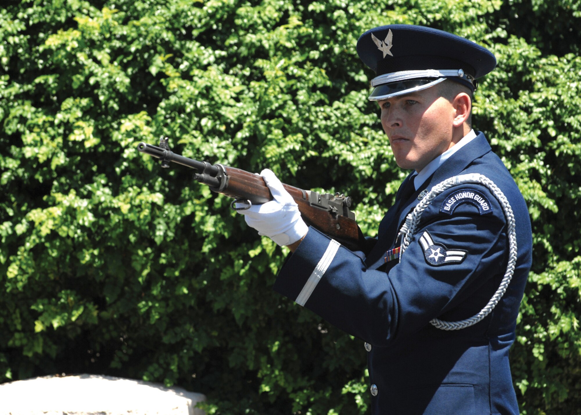 Airman 1st Class James Beasley, 56th Civil Engineer Squadron, participates in the 21-gun salute during Colonel Bomar’s memorial service. (U.S. Air Force photo/ Tech. Sgt. Jeffrey Wolfe)
