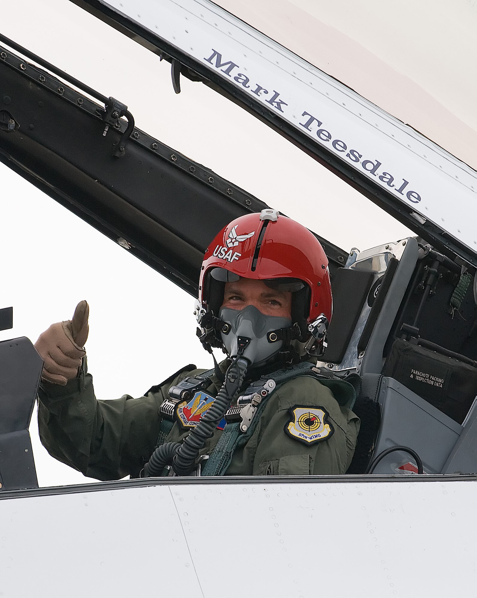 Lt. Col. Derek Routt, Thunderbirds Operations Officer, speaks with Mark Teesdale before the Hometown Hear flight at Dover Air Force Base June 18. The U.S. Air Force Thunderbirds aerial demonstration team selected Mr. Teesdale to fly with them June 19 as part of the Hometown Heroes program. Mr. Teesdale is a general music and chorus teacher at Lake Forest Central Elementary School in Felton and is the 2009 Delaware Teacher of the Year. (U.S. Air Force photo/Tom Randle)