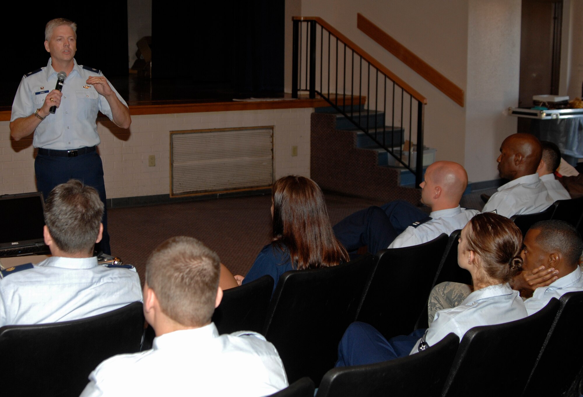 Lt. Col. Barry Jones talks to personnel about total-force integration during a commander's call at McConnell Air Force Base, Kan., on June 15. Jones is the commander of the 931st Operations Support Flight, an Air Force Reserve unit at McConnell. (U.S. Air Force photo/Senior Airman Laura Suttles)