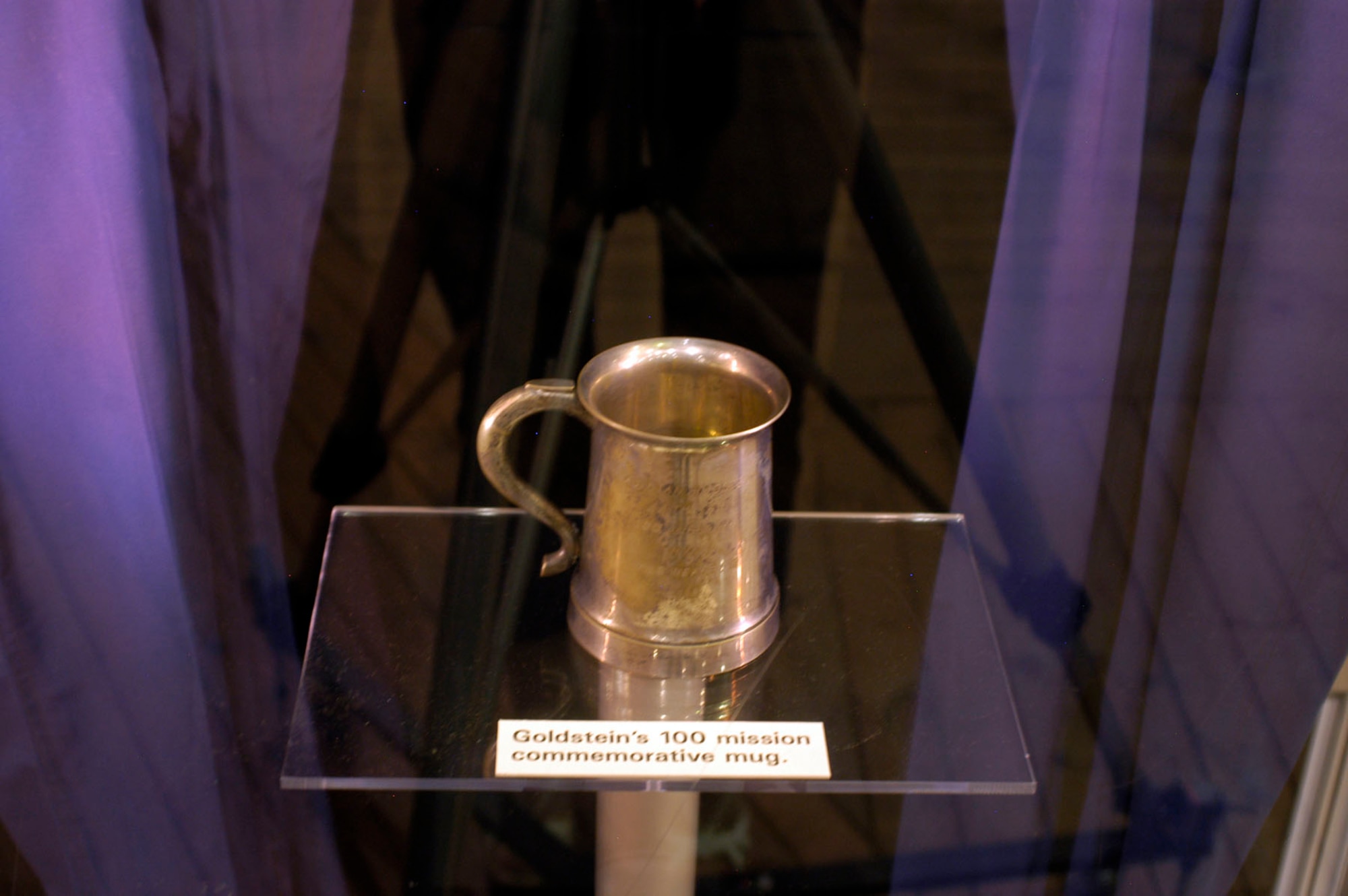 DAYTON, Ohio - Goldstein's 100 mission commemorative mug on display in the First In, Last Out: Wild Weasels vs. SAMs exhibit in the Southeast Asia War Gallery at the National Museum of the U.S. Air Force. (U.S. Air Force photo)