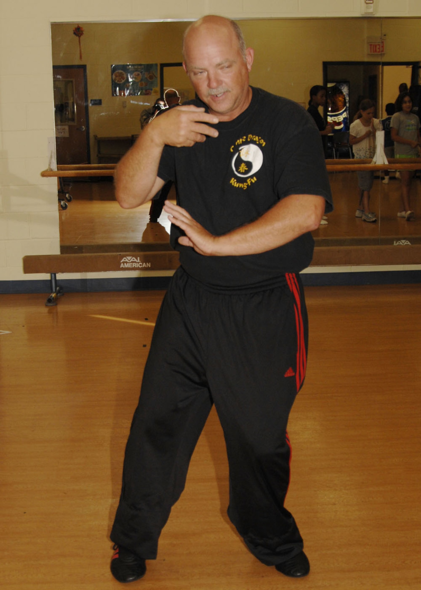 SCOTT AIR FORCE BASE, Ill. -- Sergeant Evans teaches his students to beat him because he feels if they can beat him, they will be fine in any situation. The movements look effortless, but there are lots of things that are done internally that cannot be seen by the eye. (U.S. Air Force photo/ Airman 1st Class Tristin English)