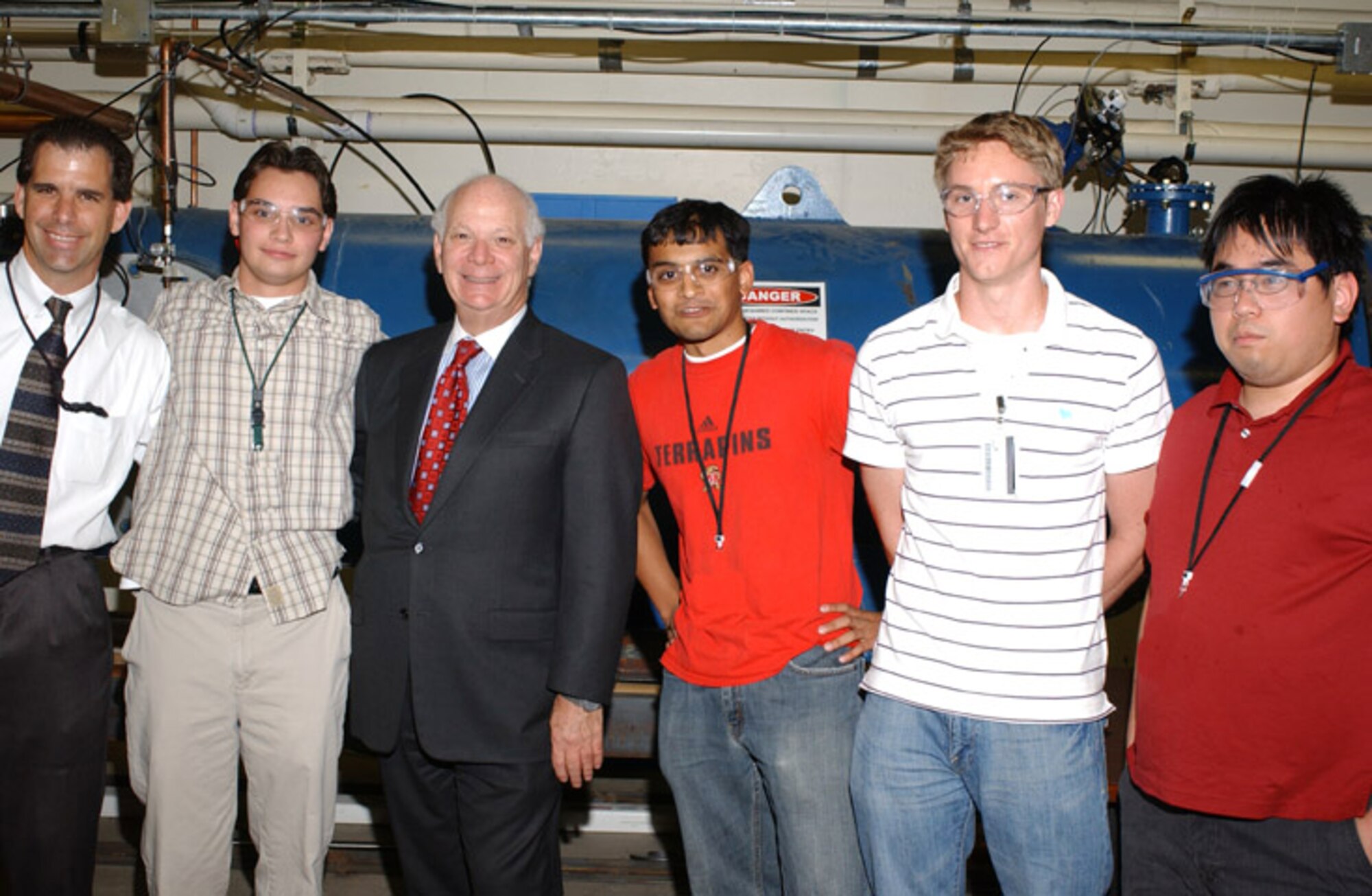 U.S. Sen. Benjamin Cardin, D-Md., stops for a photo with engineering students from the University of Maryland while visiting Arnold Engineering Development Center’s (AEDC) White Oak Site, located in Silver Spring, Md. The students work relevant problems associated with science and physics at Tunnel 9, and their contributions contribute towards advanced degrees. From left to right, Dan Marren, director of AEDC White Oak, Alex Bounitch, a junior majoring in aerospace engineering, Senator Cardin, Pratik Bhandari, a senior in the Aerospace Department, Colin Vandercreek, a graduate student in the Aerospace Department, and Brian Kwong, a senior majoring in mechanical engineering. (Photo by Arnold Collier)

