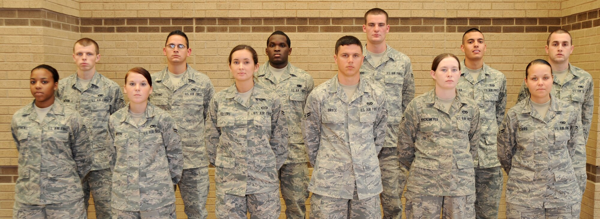 MCCONNELL AIR FORCE BASE, Kan. -- Congratulations to Team McConnell’s newest First Term Airman’s Center graduates who graduate today. Front row: Airmen 1st Class Brooklyn Matthews, Heleina Mixon, Heather Fellers, Cody Bryce, Brittany Hockemeyer and Kate Myers.  Back row: Airmen 1st Class Richard Mixon, John Lozano, Andre Vines, Troy Howard, Patrick Lara and Airman Jason Zink.  (Photo by Senior Airman Roy Lynch)