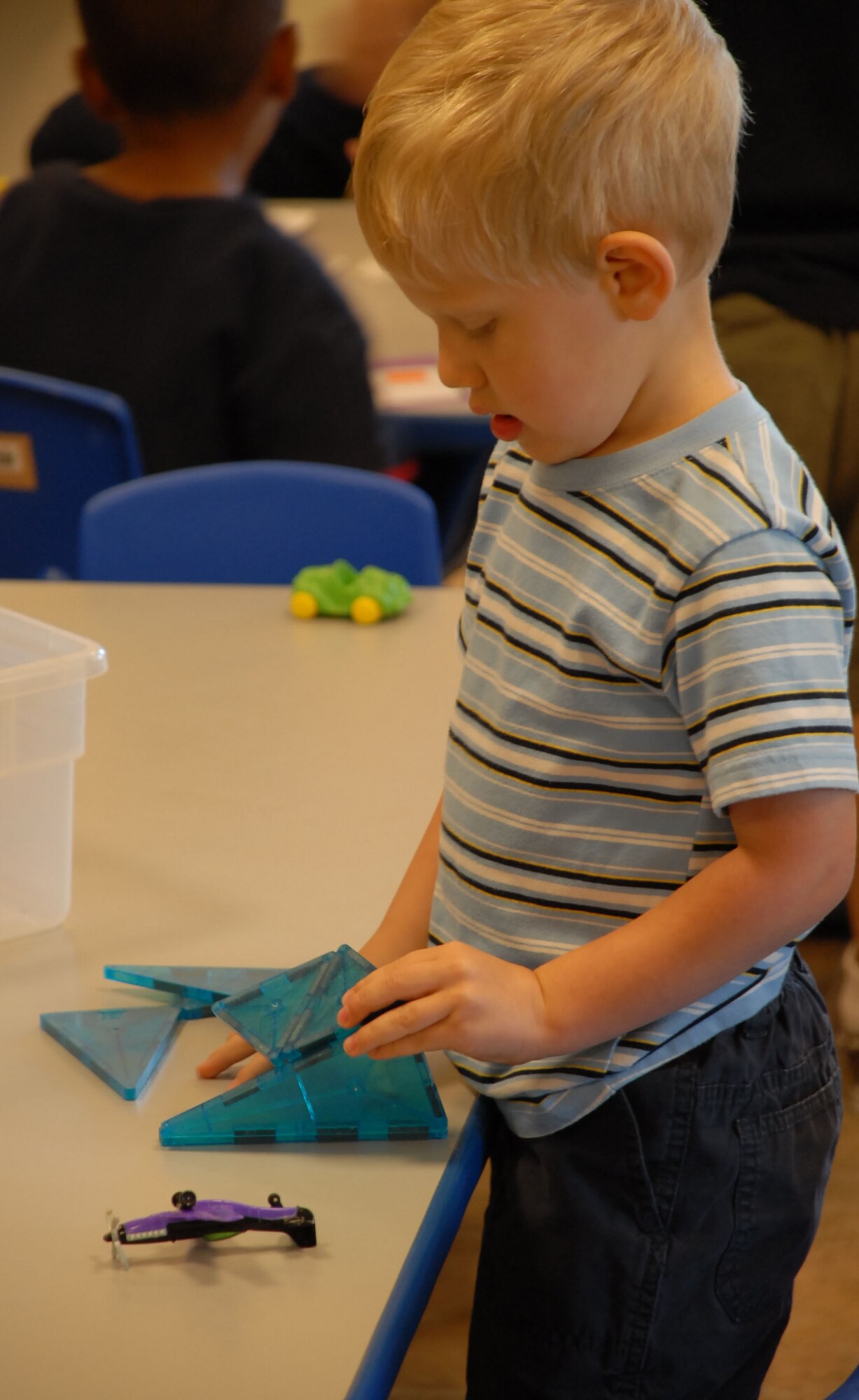 Jaiden Johnson, 3, plays with toys June 17 at the CDC. The CDC provides all the tools necessary for an educational, yet fun, learning experience for the children.(Photo by Airman 1st Class Chuck Broadway)