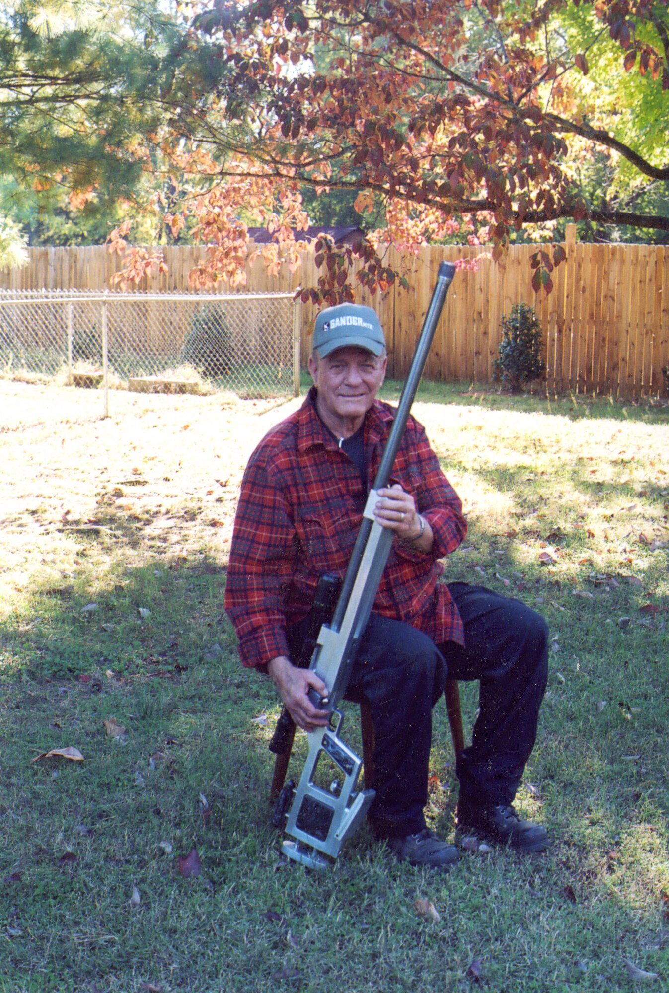 Larry “Pappy” Phillips holds his turkey shoot gun that he designed a portion of in his spare time. (Photo provided)
