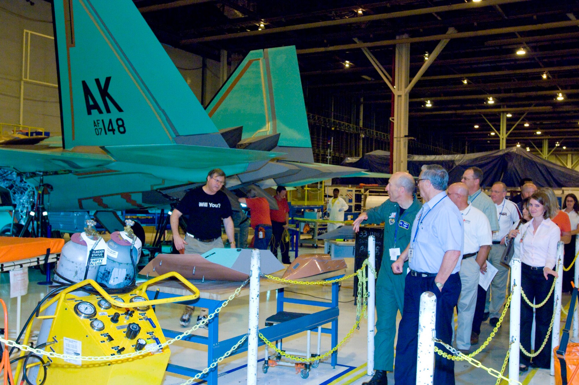 A group of civic leaders from middle Tennessee tour the Lockheed Martin assembly plant in Marietta, Ga., during the two-day tour hosted by Arnold Engineering Development Center. Seen here is a Raptor before the aircraft undergoes final system and related checks prior to a flight test. (Photo courtesy of Lockheed Martin)