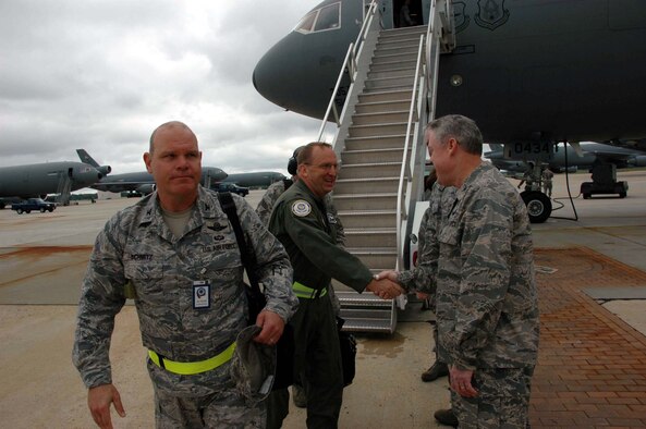 JOINT BASE MCGUIRE-DIX-LAKEHURST -- Col. James L. Kerr, right, commander of the 514th Air Mobility Wing greets the Air Mobility Command Inspector General team leaders upon the group's arrival here Sunday. Joint Base McGuire-Dix-Lakehurst Reserve and active duty members are undergoing a weeklong series of tests to validate their war time readiness, capability and compliance. (U.S. Air Force photo/Master Sgt. Charles Kramer)