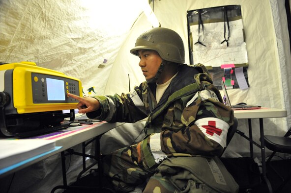 SHAW AIR FORCE BASE, S.C. -- Technical Sgt. Paolo Ablang, 20th Aeromedical-Dental Squadron bioenvironmental engineer, calibrates his equipment for the next air sample to be tested for chemical contaminants during Team Shaw's operational readiness inspection, June 17. The ORI will evaluate the training and preparedness of Shaw Airmen for worldwide deployment. (U.S. Air Force photo/Senior Airman Kathrine McDowell) 
