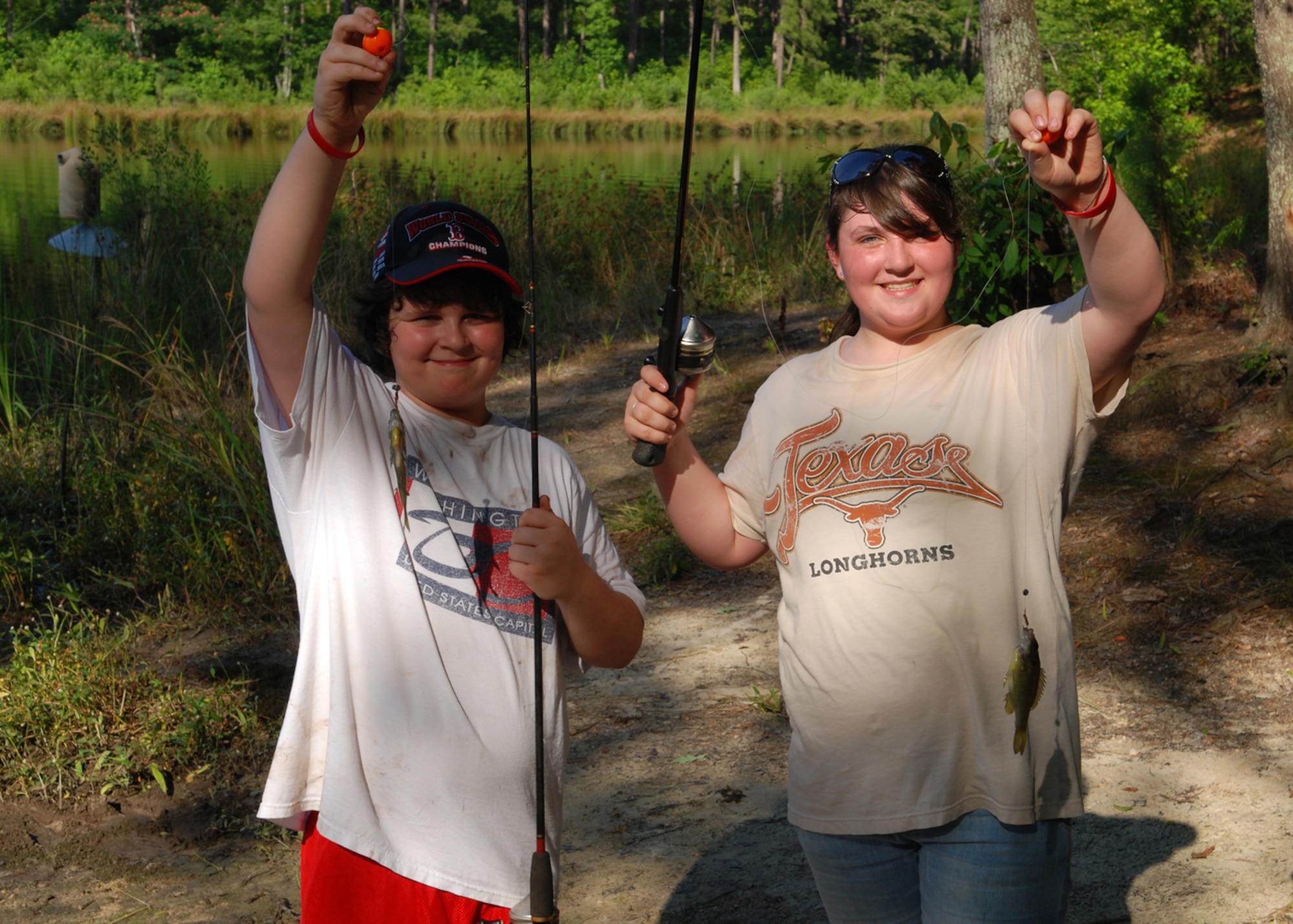Eli Steele, 10, and his sister Delaney Steele, 12, show off their trophy fish at Harmon Lake on the East Reservation of Barksdale Air Force Base, La., June 13, 2009. The children were on a family fishing trip with their father Master Sgt. Greg Steele, 47th Fighter Squadron, visual information technician, who decided to utilize one of the many recreational opportunities offered on Barksdale for the family outing. Sergeant Steele is an Air Reserve Technician with the 47th FS. (Courtesy photo) 