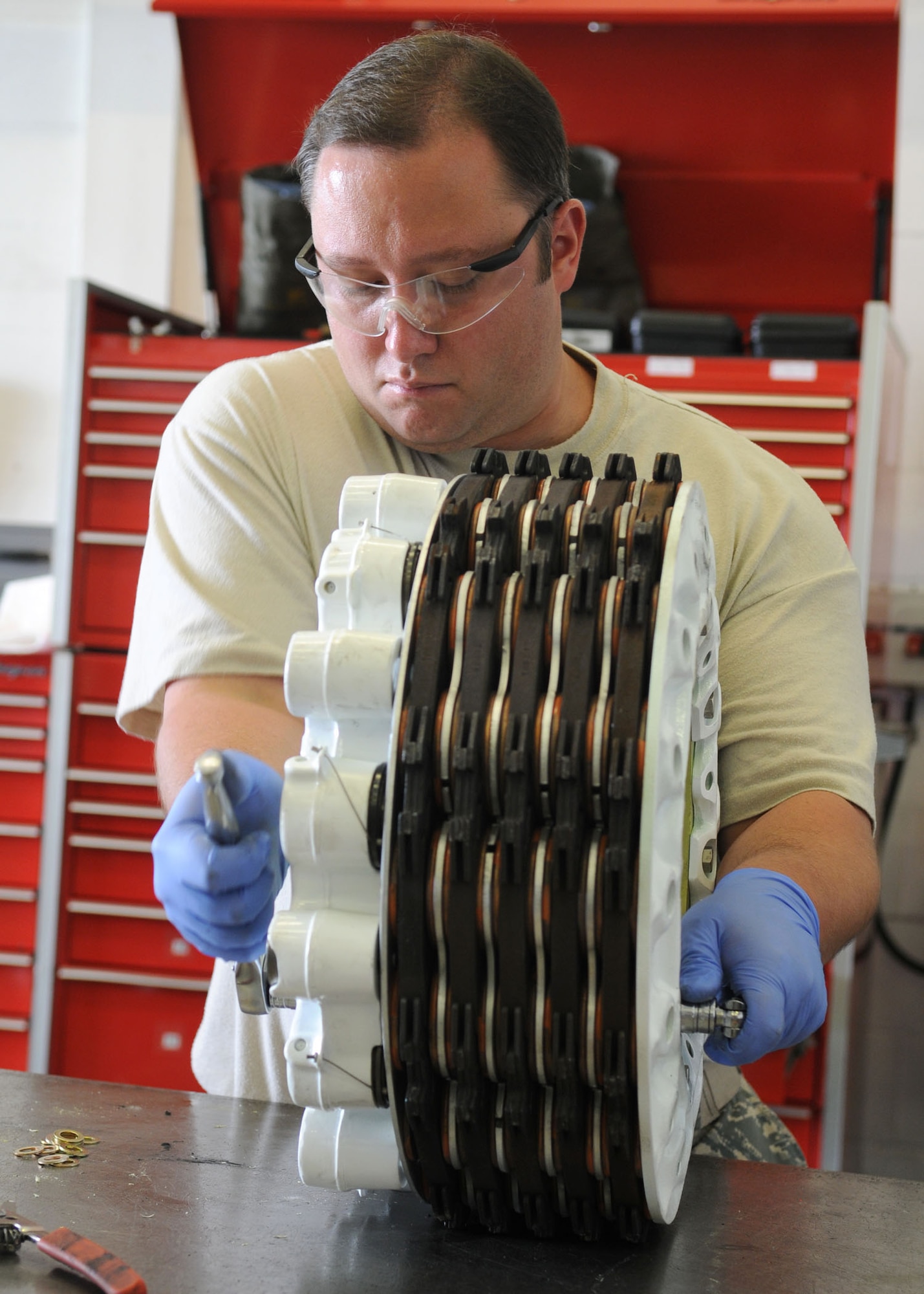 Staff Sgt. Ernest Kretschmar, 100th Maintenance Squadron hydraulics craftsman, torques the final set of nuts during a brake assembly rebuild for the KC-135 June 15, 2009, at RAF Mildenhall, England. The hydraulic shop is responsible for various parts of the KC-135 and C-130 aircraft. The hydraulic backshop performs inspections and maintenance on hydraulic related items. (U.S. Air Force photo by Staff Sgt. Jerry Fleshman)