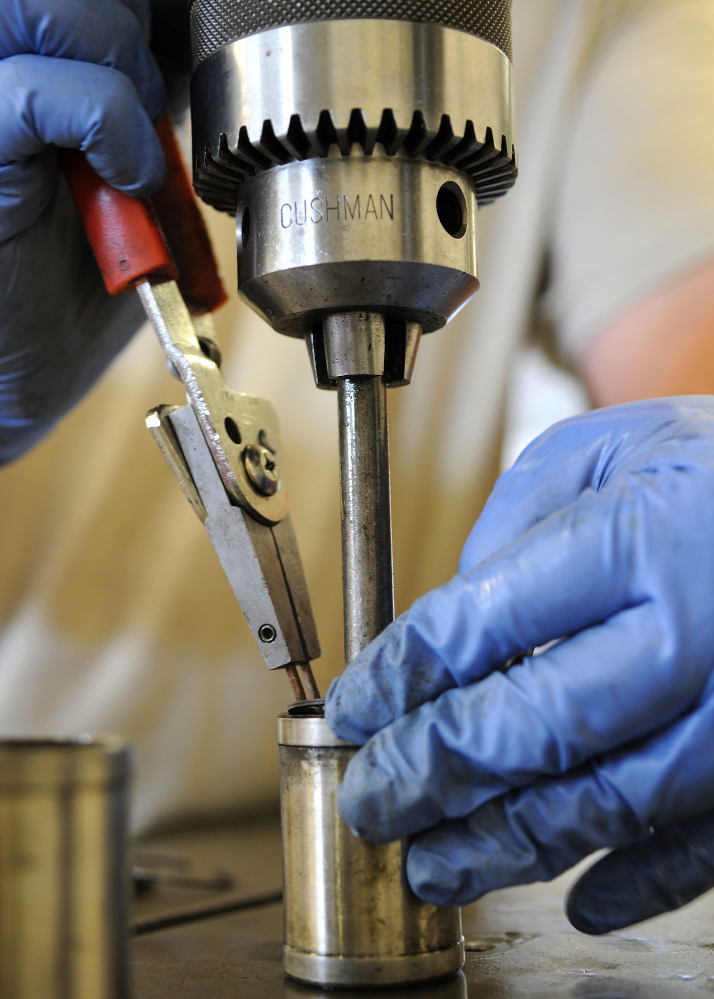 Staff Sgt. Ernest Kretschmar, 100th Maintenance Squadron hydraulics craftsman, installs a lock ring into a compressed return spring in the brake piston during a KC-135 brake assembly rebuild June 15, 2009, at RAF Mildenhall, England. The hydraulic shop is responsible for various parts of the KC-135 and C-130. The hydraulic backshop performs inspections and maintenance on hydraulic-related items. (U.S. Air Force photo by Staff Sgt. Jerry Fleshman)