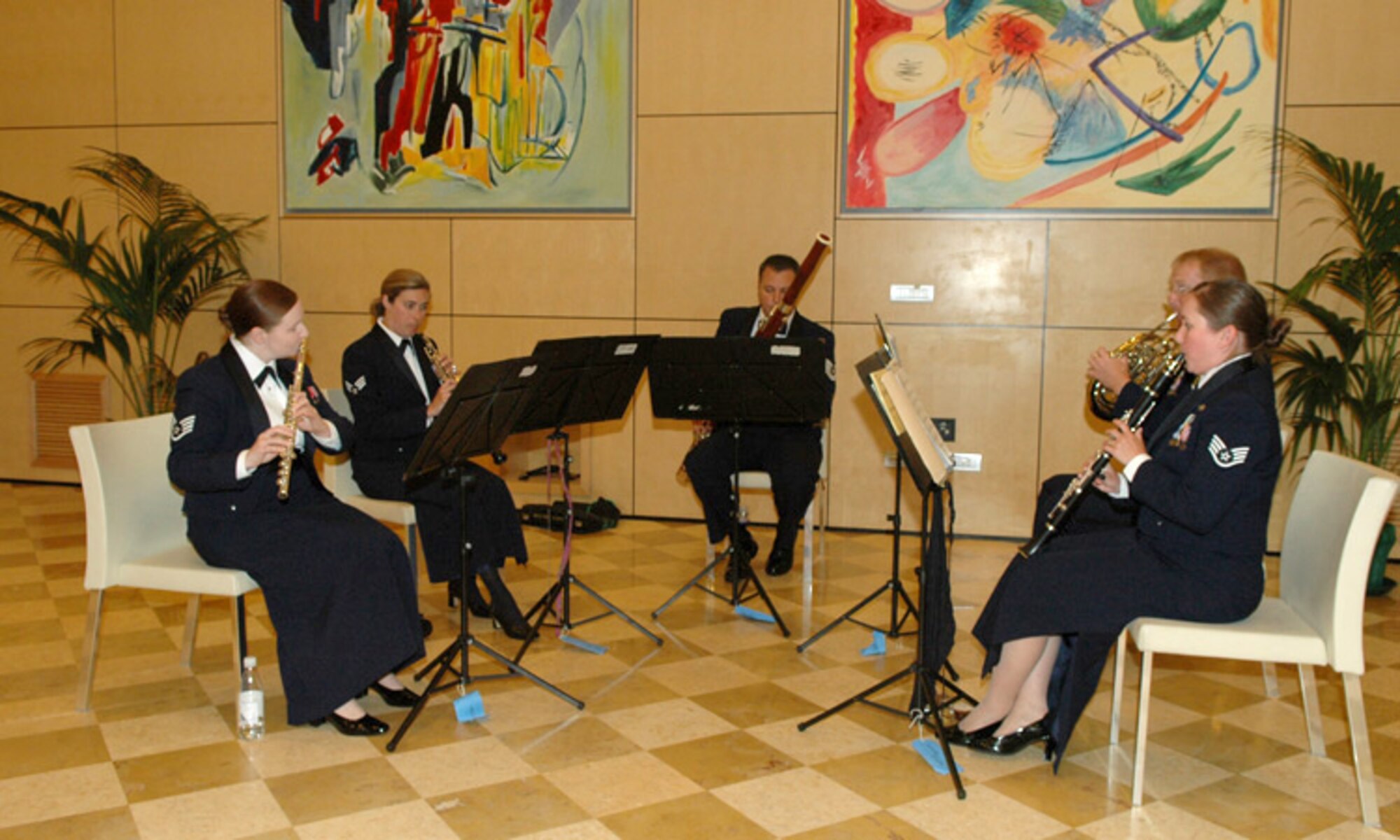 The U.S. Air Forces in Europe "Winds Aloft Woodwind Quintet" perform during a dinner for a 44-member delegation representing military and civilian leaders from 32 countries on June 11, 2009, in Padova, Italy. The dinner was part of the Vienna Document 1999 visit to military installations in northeastern Italy June 8-11.  The quintet entertained delegates from such countries as Thailand, Egypt and Mongolia, and provided them a taste of America during their visit to Italy. (U.S. Air Force photo/Staff Sgt. Mercedes Crossland)