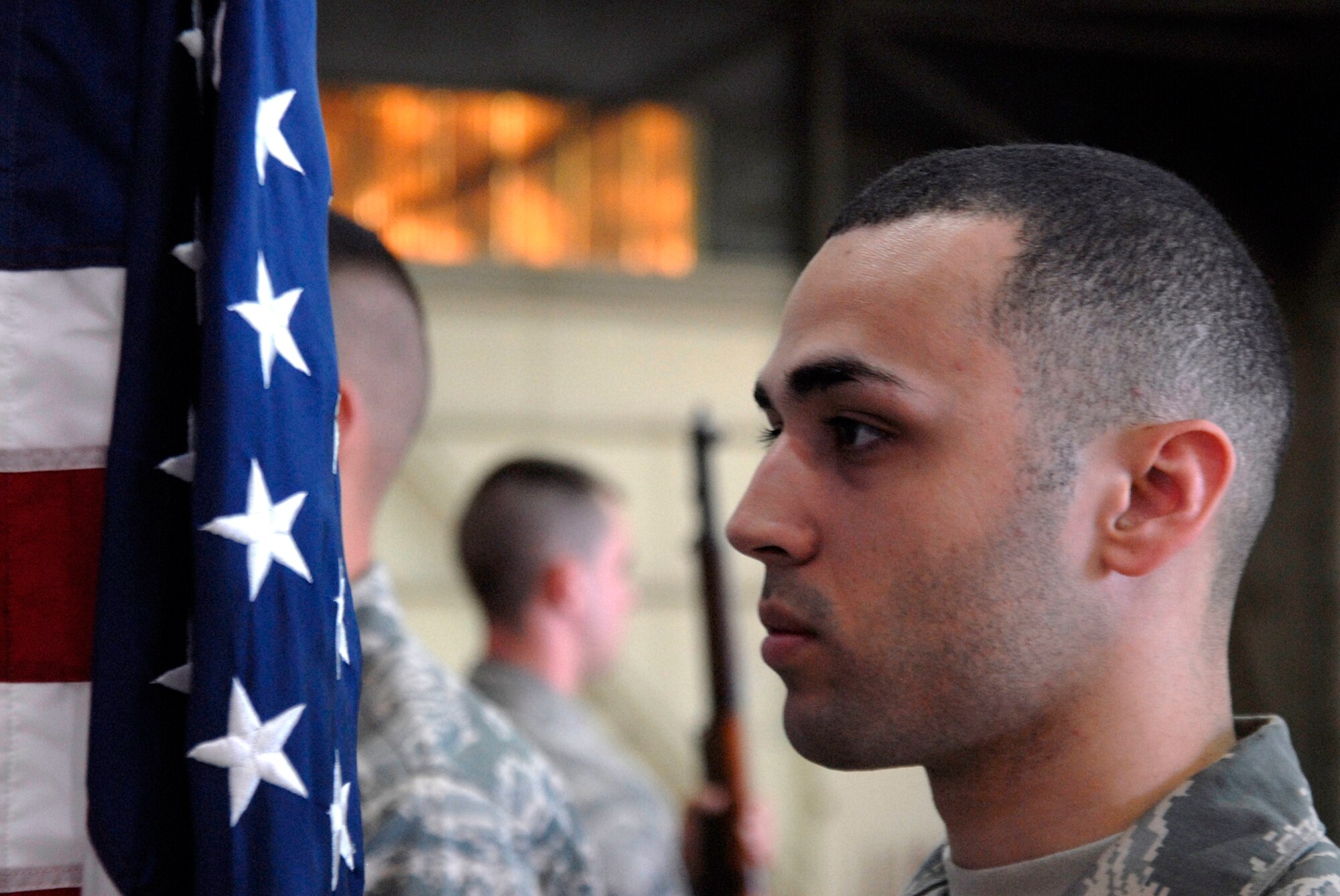 Staff Sgt James Mejias, 8th Maintenance Squadron, ensures that the American Flag is straight while participating in Honor Guard practice at Kunsan Air Base, Republic of Korea, June 3. Kunsan's Honor Guard performs ceremonies ranging from change of command ceremonies to retirements. (U.S. Air Force Photo by SSgt Jason Colbert)





