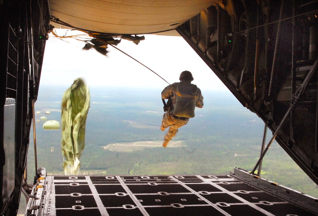 A U.S. Army soldier leaps from the ramp of a C-130 aircraft during an airborne operation on Fort Bragg, N.C., June 6, 2009. The soldier is assigned to the 28th Combat Support Hospital.