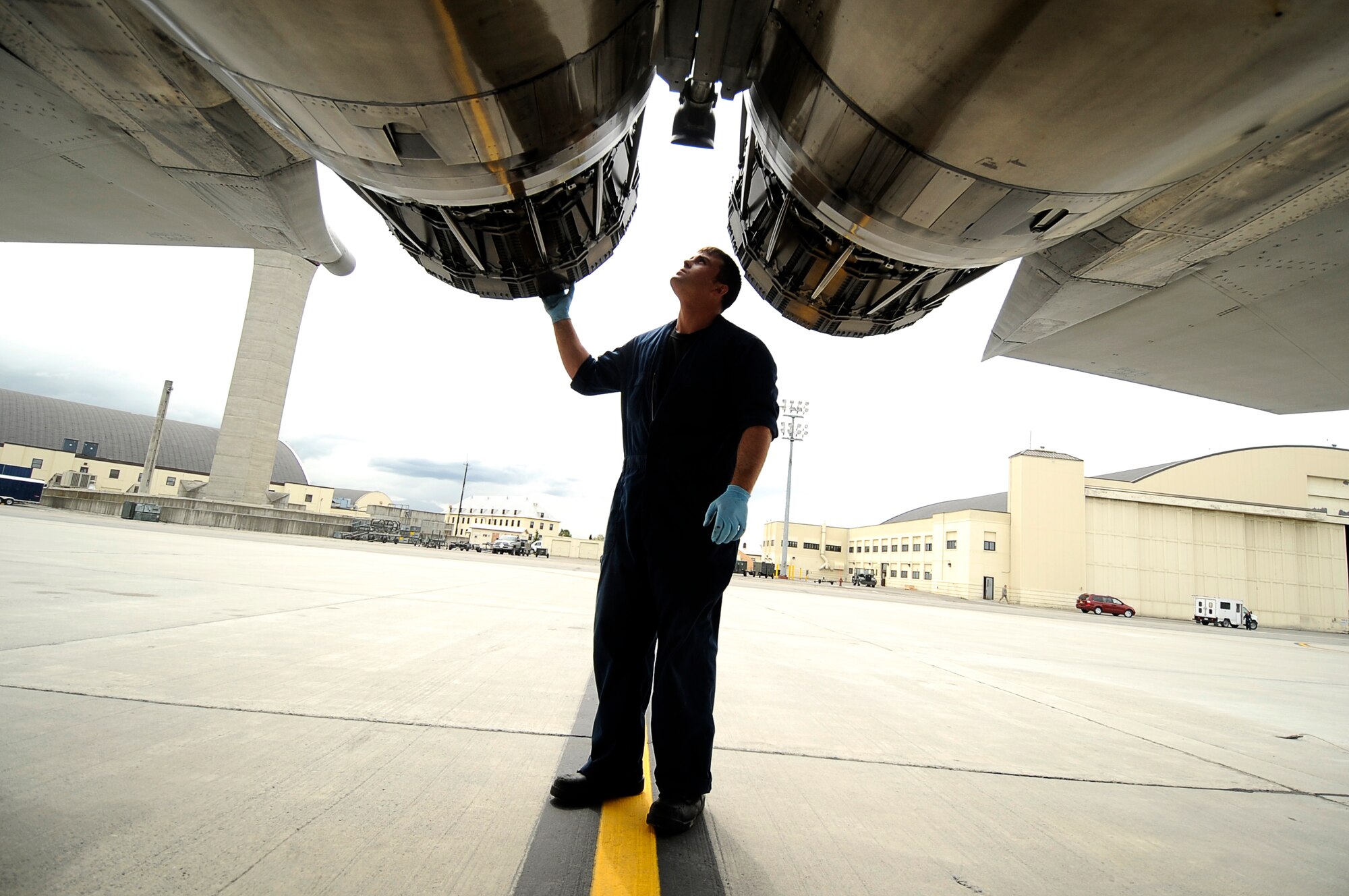 ELMENDORF AIR FORCE BASE, Alaska -- Senior Airman Zach Gartner from the 57th Aircraft Maintenance Squadron, Nellis Air Force Base, Nev., recovers an F-15 Eagle during exercise Northern Edge 2009, Elmendorf AFB, Alaska, June 18, 2009.  Northern Edge 2009 is Alaska's largest military training exercise. It prepares joint forces to respond to crises throughout the Asia-Pacific region. (U.S. Air Force photo/Tech. Sgt. Dennis J. Henry Jr.)