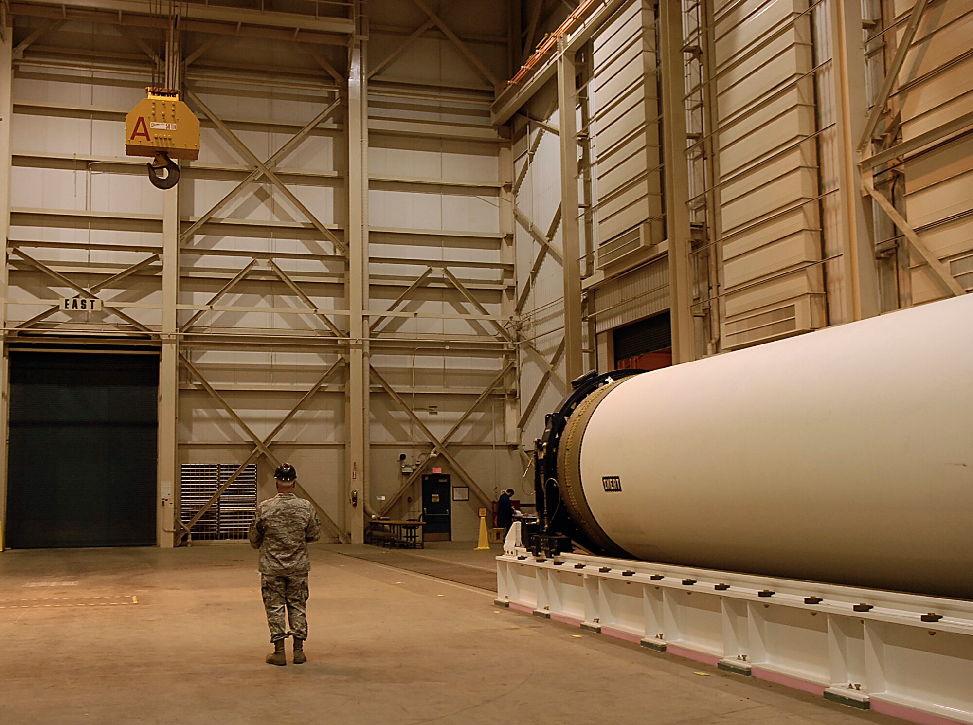 VANDENBERG AIR FORCE BASE, Calif. --  Master Sgt. David Grimes, who works in the 1st Air and Space Test Squadron maintenance flight, prepares a 50-ton overhead gantry crane used to lift Minotaur IV rocket motors for processing and assembly by 1st ASTS maintainers. The Minotaur IV is new and set for an inaugural launch in October 2009. (U.S. Air Force photo/Staff Sgt. Vanessa Valentine)
