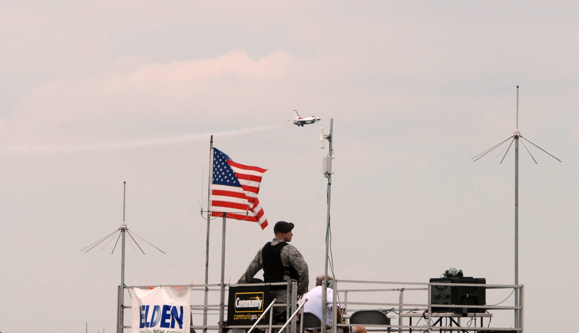 A U.S. Air Force Thunderbird F-16 Falcon flies over center stage at over Air Force Base June 19. The base is open to the public for their Open House and Air Show June 20-21. (U.S. Air Force photo/Tech. Sgt. Kevin Wallace)