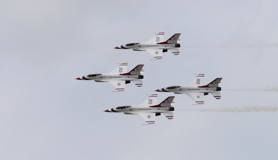 Four U.S. Air Force Thunderbirds perform a ‘Trail to Diamond Pass’ maneuver in the skies over Dover Air Force Base June 19. The base is open to the public for their Open House and Air Show June 20-21. (U.S. Air Force photo/Tech. Sgt. Kevin Wallace)
