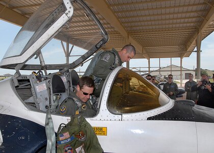 Lt. Col. Doug Antcliff and 2nd Lt. Trevor Kernes prepare to egress a T-37B Tweet June 17 at Sheppard Air Force Base, Texas, marking the end of the aircraft's more than 50-year service to the Air Force. More than 78,000 Air Force pilots have trained in the Tweet since 1959. Colonel Antcliff is a 19th Air Force standards and evaluation pilot. Lieutenant Kernes is a student pilot. (U.S. Air Force photo/Harry Tonemah)