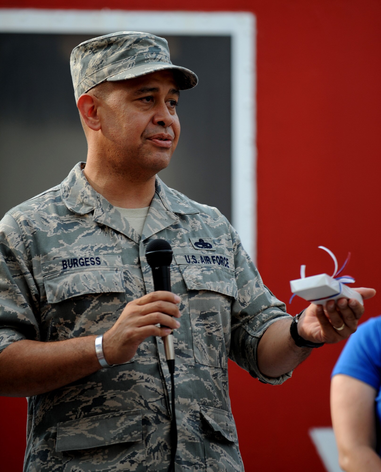 MOODY AIR FORCE BASE, Ga. -- Chief Master Sgt. Paul Burgess, 23rd Wing command chief, speaks to citizens of Hahira, Ga., after receiving the key to the city June 18. Chief Burgess received the key from Wayne Bullard, the mayor of Hahira, during the Hahira Salutes the Red, White and Blue festival. (U.S. Air Force photo by Senior Airman Gina Chiaverotti)