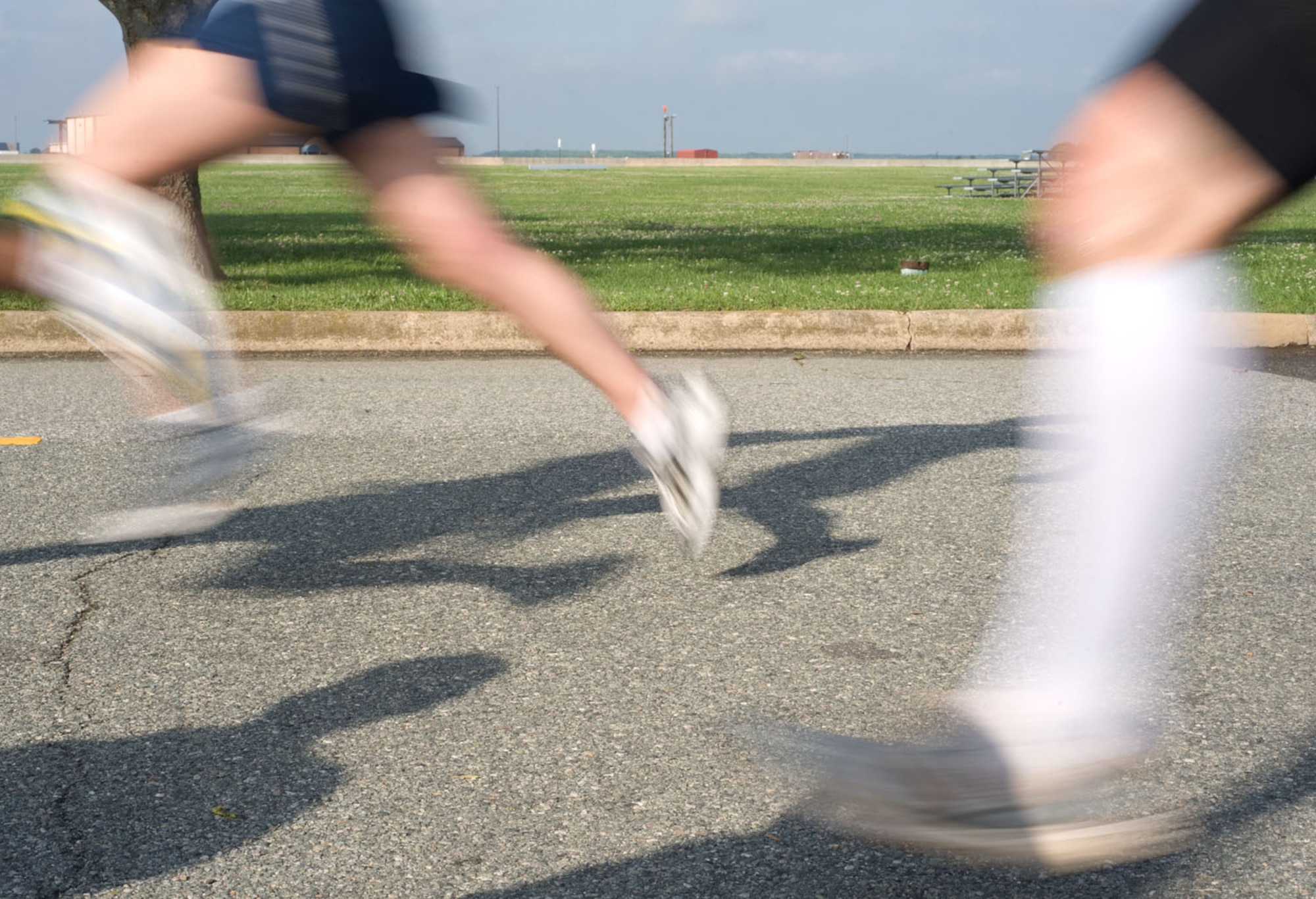 LANGLEY AIR FORCE BASE, Va. – Airmen run toward the finish line during the 2009 Langley Chief's Group Annual Spring Fun Run here June 19.  More than 150 runners participated in the 5K.  The Chief's Group will use the proceeds to fund professional military education programs such as Airman Leadership School, First Term Airman Center and Non-commissioned Officer Academy graduation ceremonies.  (U.S. Air Force photo/Staff Sgt. Barry Loo)