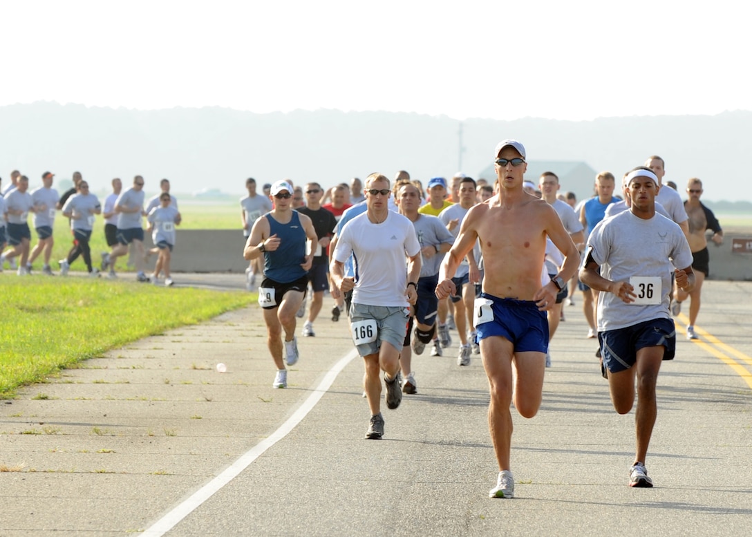 LANGLEY AIR FORCE BASE Va. -- Langley personnel run hard during the 2009 Langley Chief's Group Annual Spring Fun Run here June 19.  More than 150 runners participated in the 5K.  The Chief's Group will use the proceeds to fund professional military education programs such as Airman Leadership School, First Term Airman Center and Non-commissioned Officer Academy graduation ceremonies. (U.S. Air Force photo/Airman 1st Class Jonathan Koob)