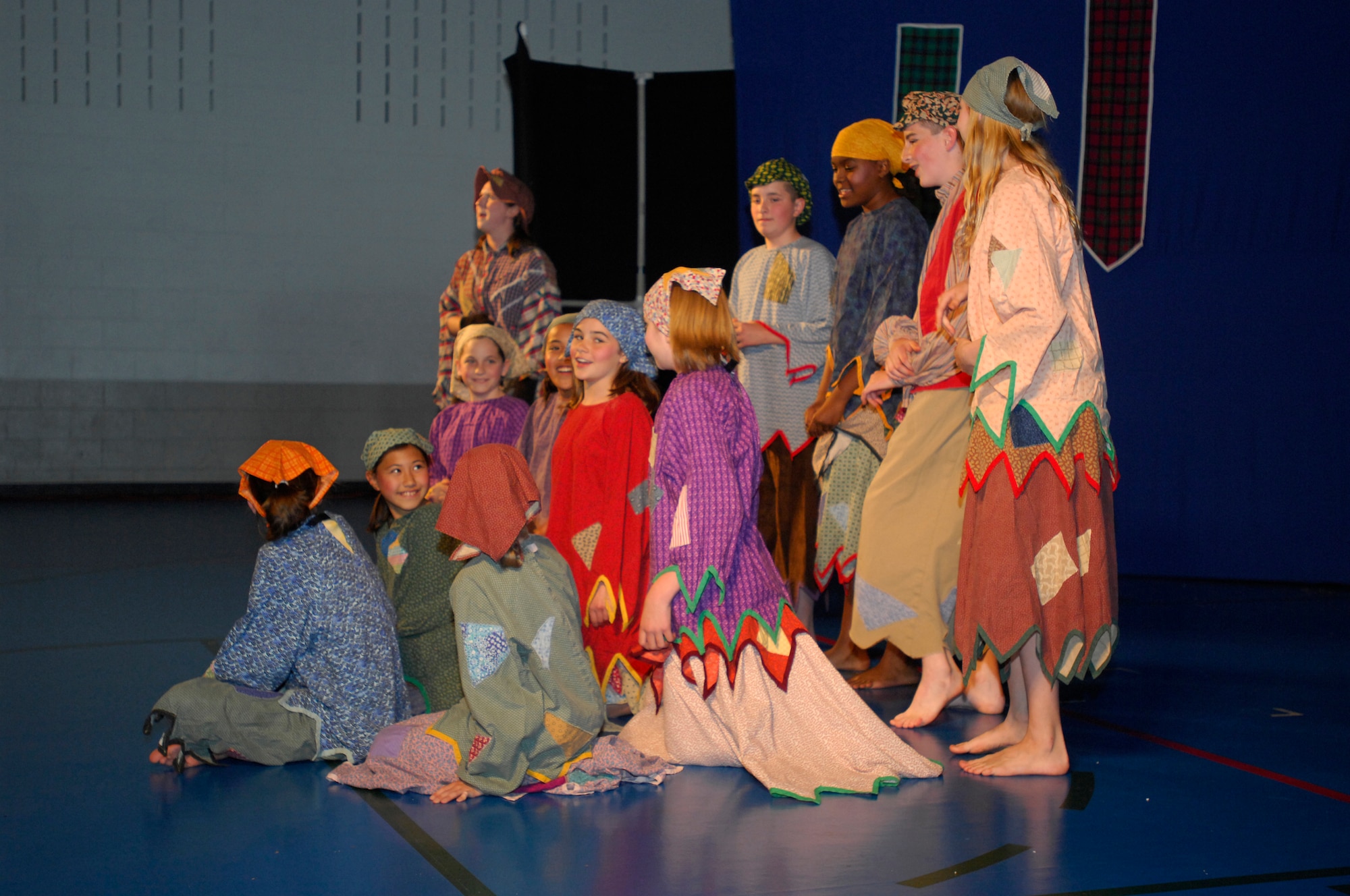 MINOT AIR FORCE BASE, ND -- Children from the base perform a play production entitled "Cinderella" at the David C. Jones Youth Center here June 12. The Missoula Children's Theater sponsored the event. The MCT uses the performing arts as a vehicle to help children develop the life-skills necessary to answer challenges they may face in life. (U.S. Air Force Photo by: Airman 1st Class Jesse Lopez)  