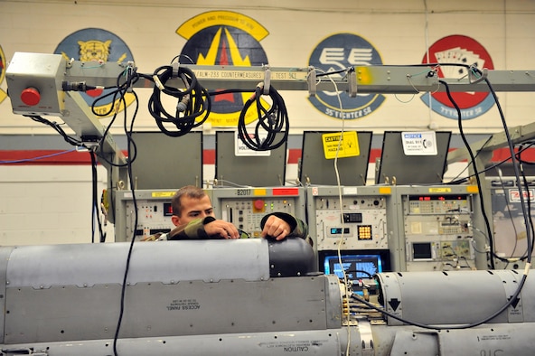 SHAW AIR FORCE BASE, S.C. -- Airman Justin King, 20th Component Maintenance Squadron, prepares a pod for its final check during Team Shaw's operational readiness inspection, June 17. The ORI will evaluate the training and preparedness of Shaw Airman for worldwide deployment. (U.S. Air Force photo/Senior Airman Kathrine McDowell)
