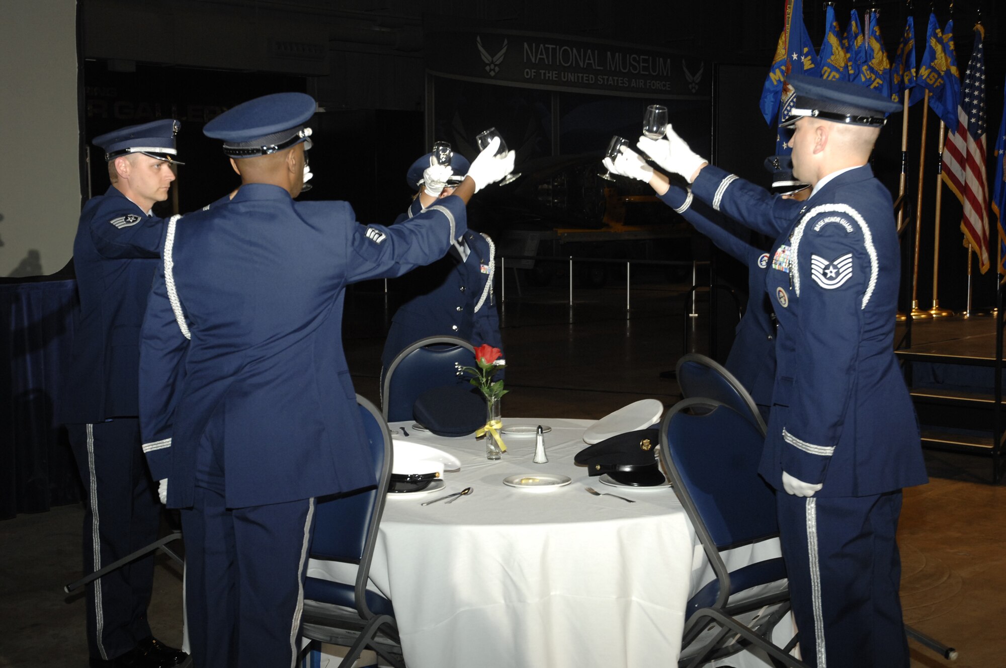 WRIGHT-PATTERSON AIR FORCE BASE, Ohio – The 445th Honor Guard honors the POW table during a short presentation at the start of the wing’s military ball June 6, 2009.  Reservists and their guests enjoyed a night of music, award presentations, and dancing during the event.  Lt. Gen. Charles E. Stenner, Jr, Chief of Air Force Reserve and Commander, Air Force Reserve Command, was the guest speaker. (Air Force photo/Mr. Al Bright)