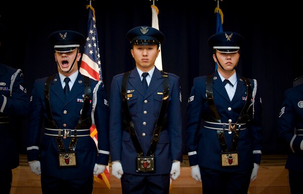 MISAWA AIR BASE, Japan -- A combined honor guard team of U.S. and Japanese military members posts the colors during Chief Master Sgt. Ricky Price's retirement ceremony June 19, 2009. The ceremony highlighted his 25-year career in the U.S. Air Force. (U.S. Air Force photo by Staff Sgt. Samuel Morse)