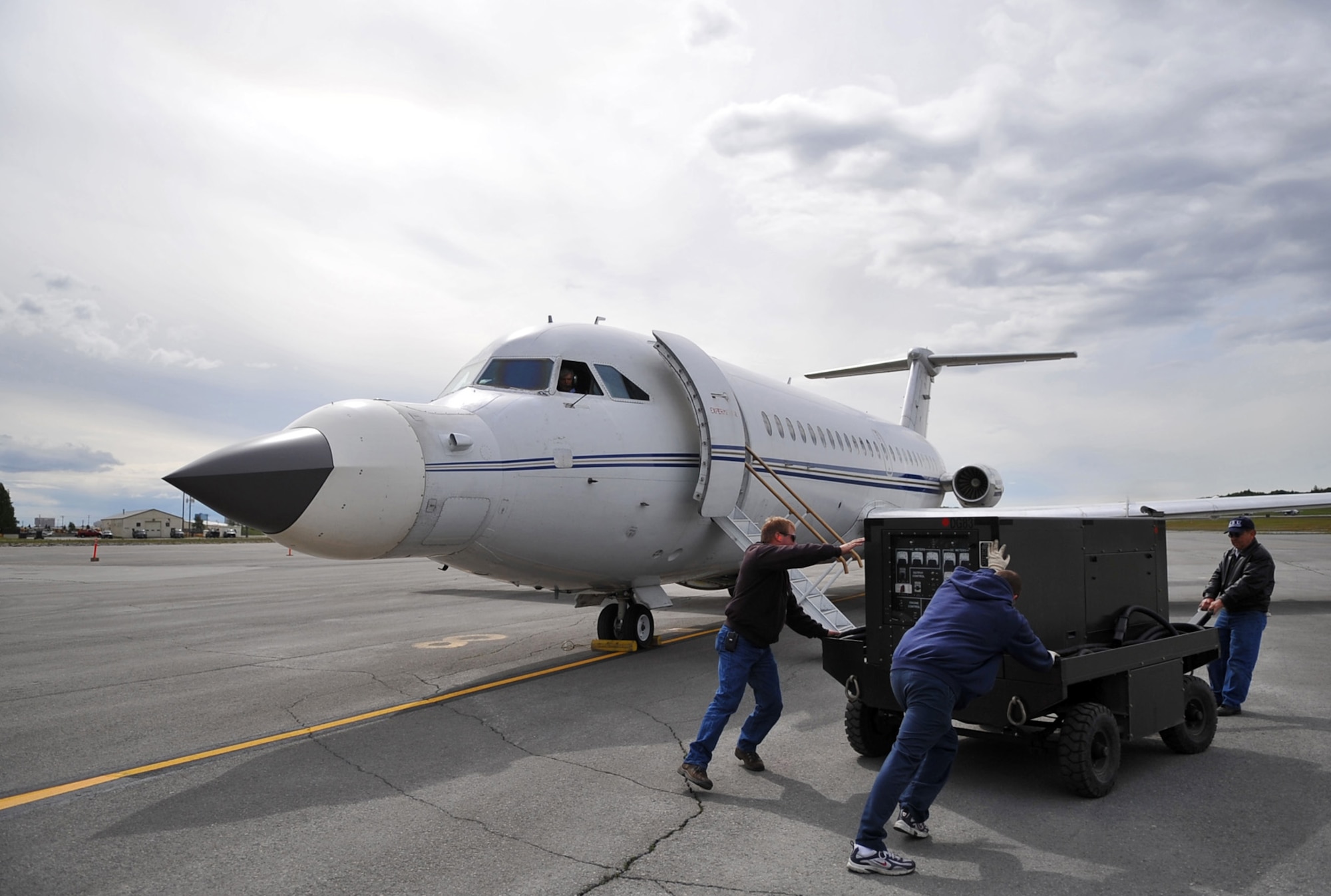 090618-F-2034C-163
Crew chiefs move an auxiliary power unit from their BAC 1-11 aircraft in preparation for a mission June 18, 2009 during Exercise Northern Edge 09 held at Elmendorf Air Force Base, Alaska. The BAC 1-11 is flying missions during Northern Edge to test the F-35 Joint Strike Fighter?s APG-81 radar. Northern Edge is the largest most complex airborne electronic warfare environment and is Alaska?s largest military training exercise that prepares joint forces to respond to crises throughout the Asia-Pacific region. (U.S. Air Force photo/ MSgt Shane A. Cuomo) RELEASED

