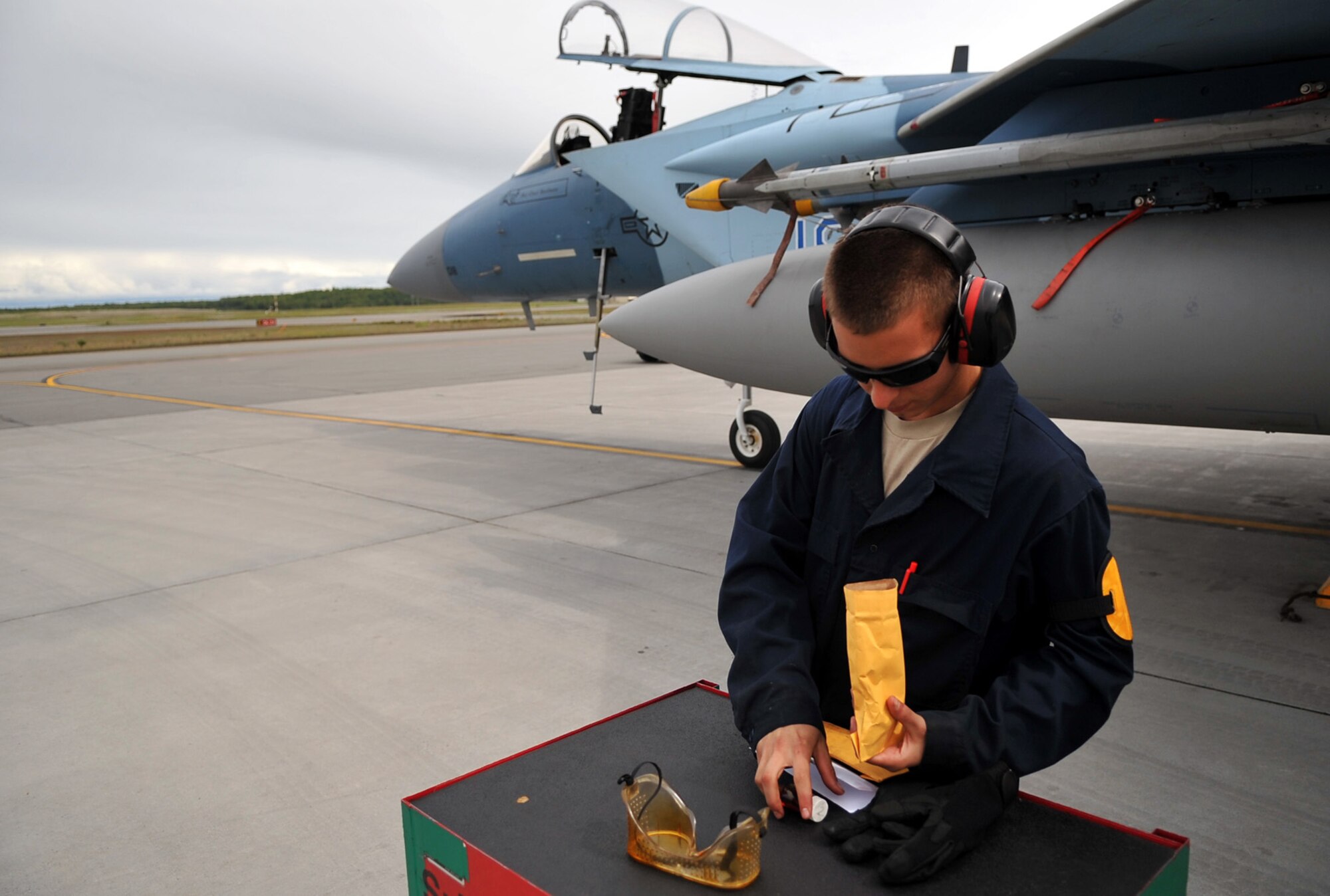 090618-F-2034C-098
Airman 1st Class Matt Alvarado  logs oil samples from  his F-15C Eagle June 18, 2009 during Exercise Northern Edge 09 held at Elmendorf Air Force Base, Alaska. A1C Alvarado is a crew chief from the 57th Aircraft Maintenance Squadron, Nellis AFB. Northern Edge is Alaska?s largest military training exercise that prepares joint forces to respond to crises throughout the Asia-Pacific region. (U.S. Air Force photo/ MSgt Shane A. Cuomo) RELEASED
