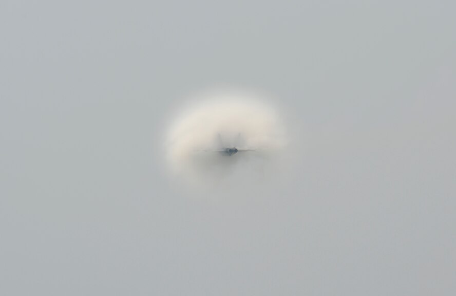 A Navy F/A-18 Super Hornet demonstrates its capabilities to the spectators at the 2009 Dover Air Force Base Open House and Air Show. Crowds still enjoyed the demonstrations and static displays after rain washed out the morning portion of the show. (U.S. Air Force photo/Jason Minto)