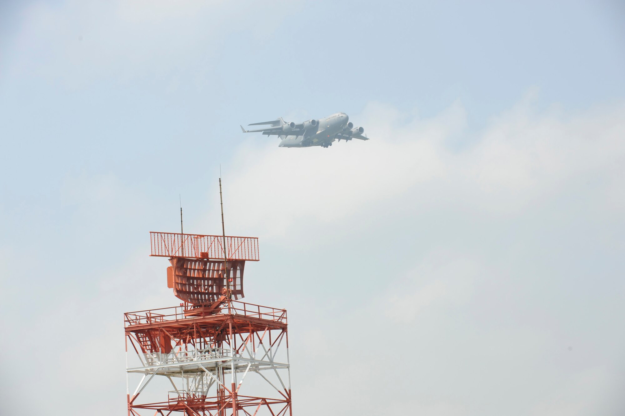 A C-17 Globemaster III performs a pass over the 2009 Dover Air Force Base Open House and Air Show June 20. The C-17 was the second demonstration of the day, following behind the C-5 Super Galaxy demonstration that started the show. (U.S. Air Force photo/Jason Minto)