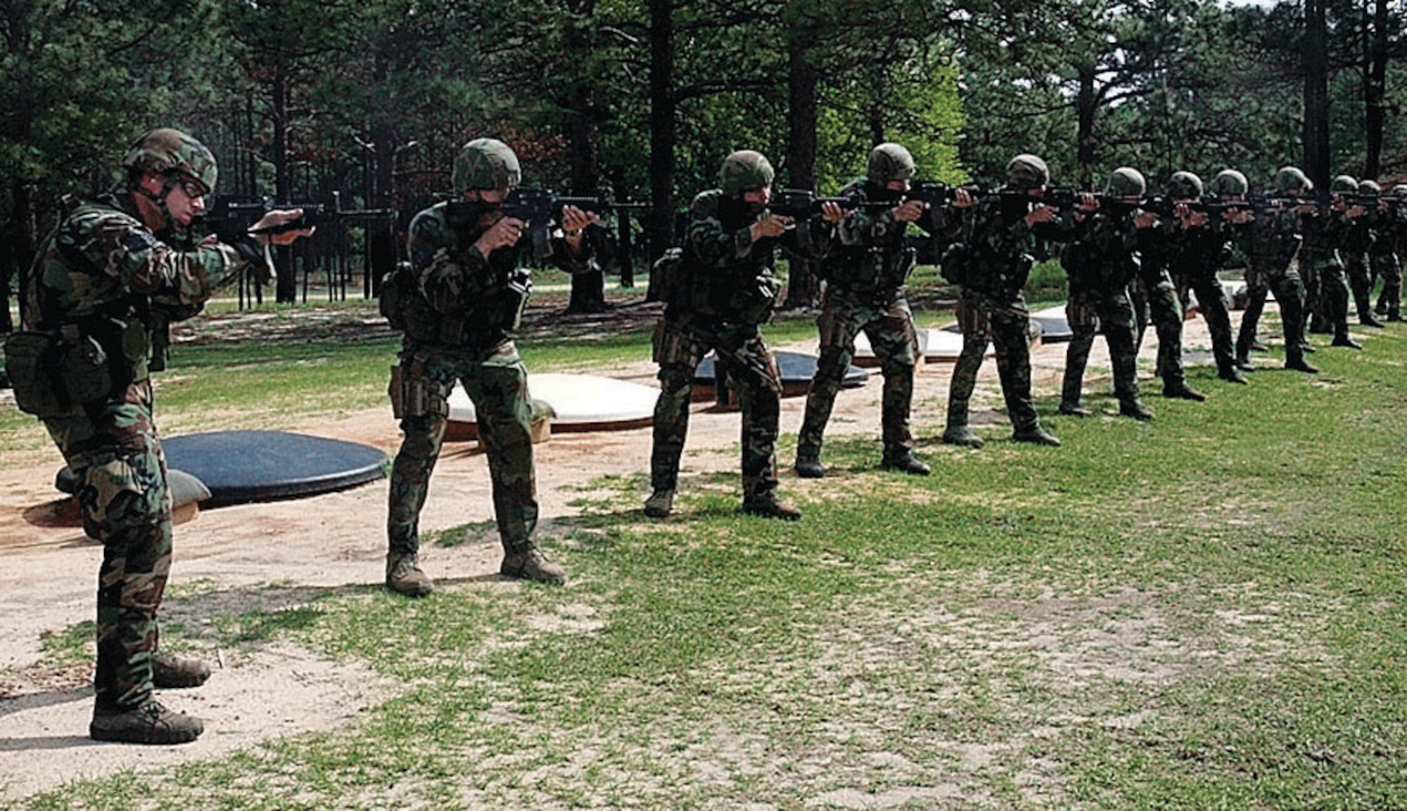 Members of Class 09-003 graduate from Combat Control School after attending training at the Pope Combat Control School.  After 13 weeks of intense training, these men successfully graduated June 18 from one of the toughest courses in the Air Force and have ultimately gained the honor of wearing the coveted red beret. (U.S. Air Force Photo by Tech Sgt. Todd Wivell)