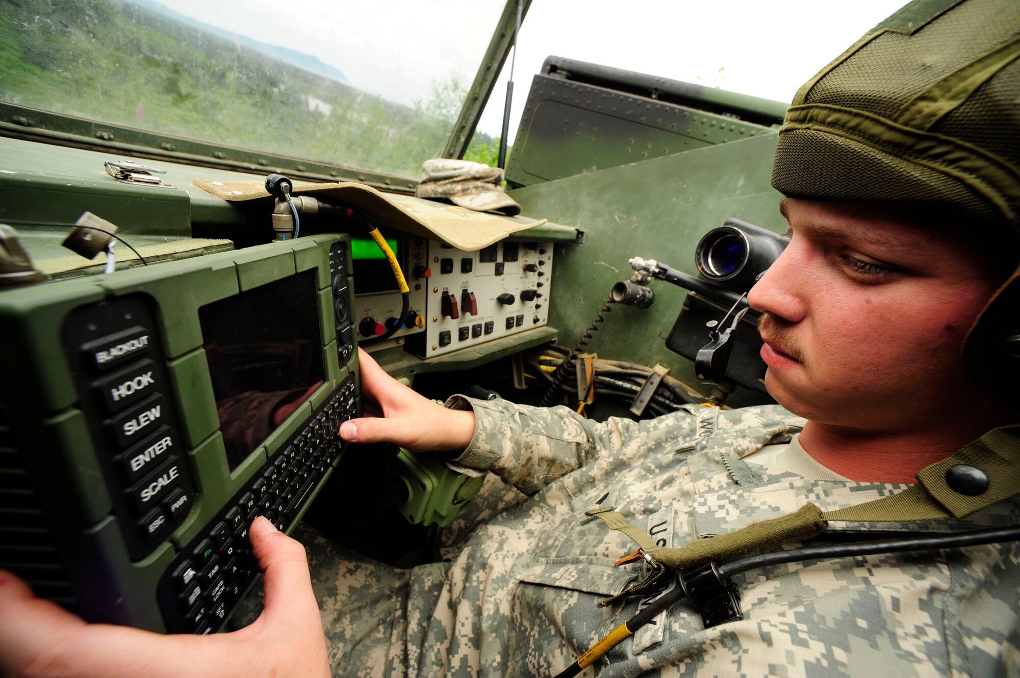 Spc. Christopher Wofford from 2nd Battalion, 263rd Army Air Missile Defense Command, conducts a systems check on an Avenger missile defense system  during Amalgam Dart 2009 near Camp Rilea, Oregon, June 15. Amalgam Dart is a field test of the Department of Defense's ability to rapidly deploy a total air integrated defense system in the U.S. in order to deter, detect and defeat airborne threats. (U.S. Air Force photo by Staff Sgt. Jacob N. Bailey)